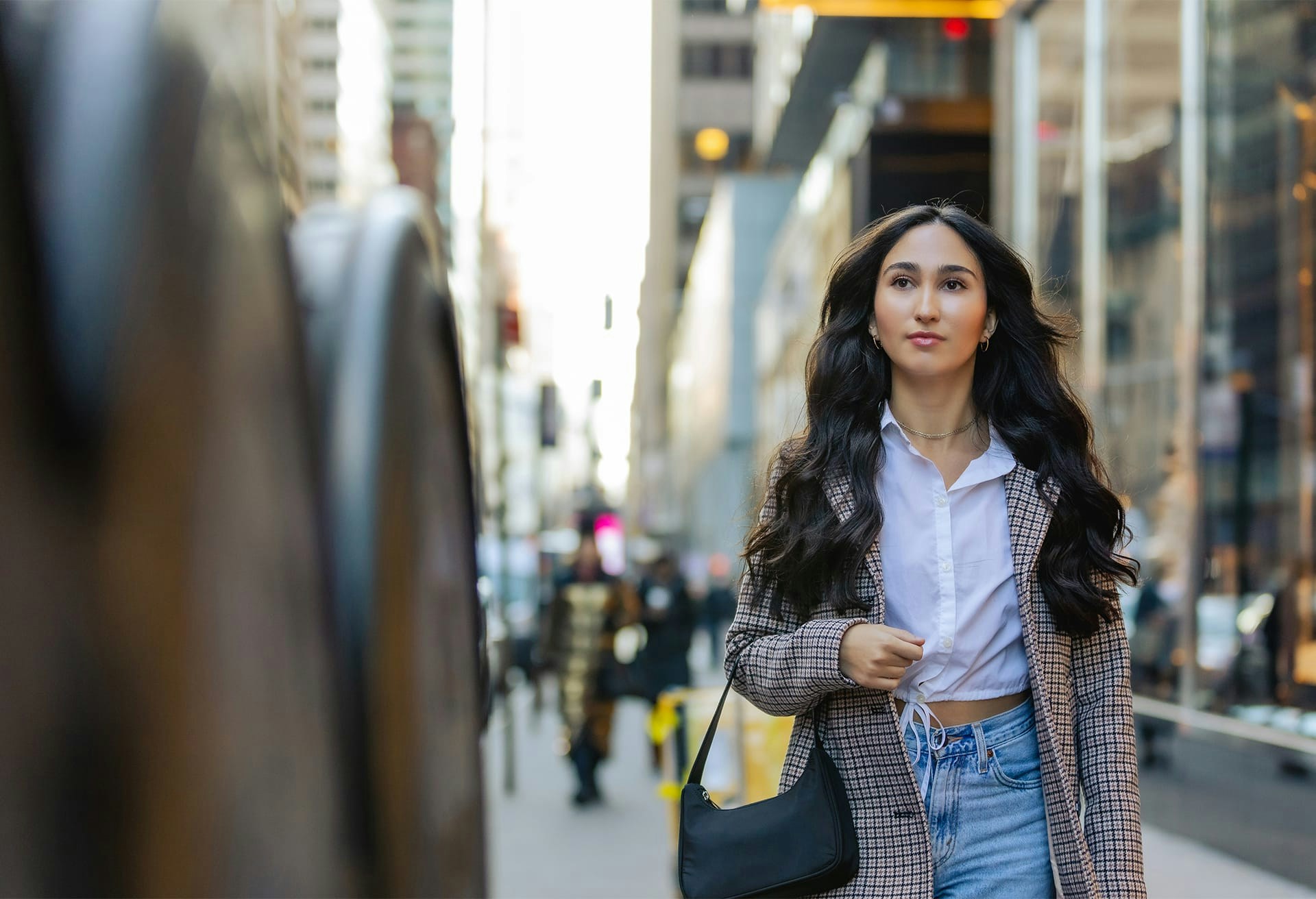 Young woman walking in the city