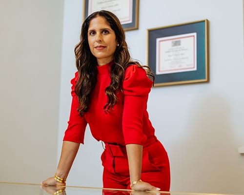 Dr. Sonia Bahlani at Pelvic Pain Doctor standing by desk