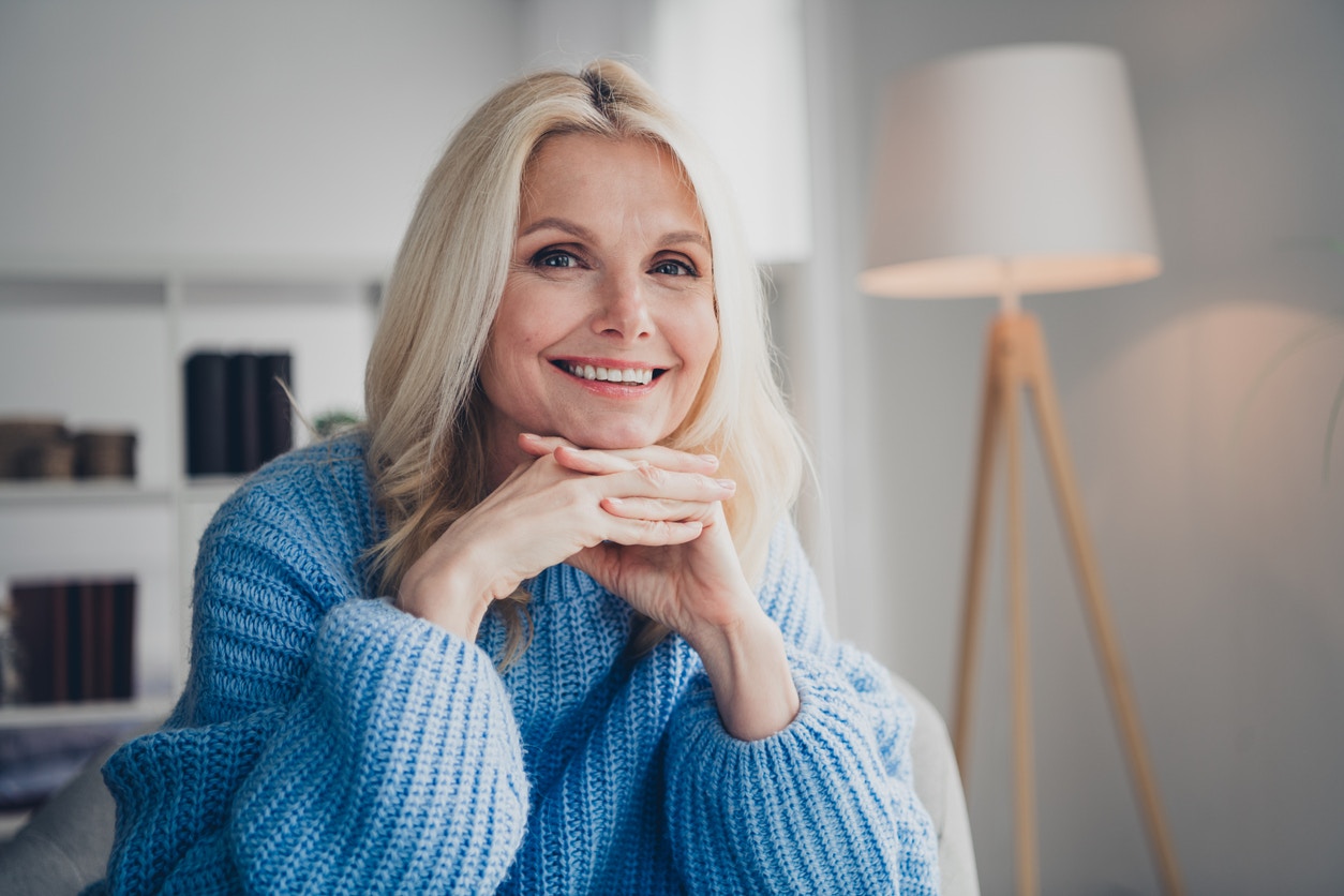 Older woman in a blue sweater
