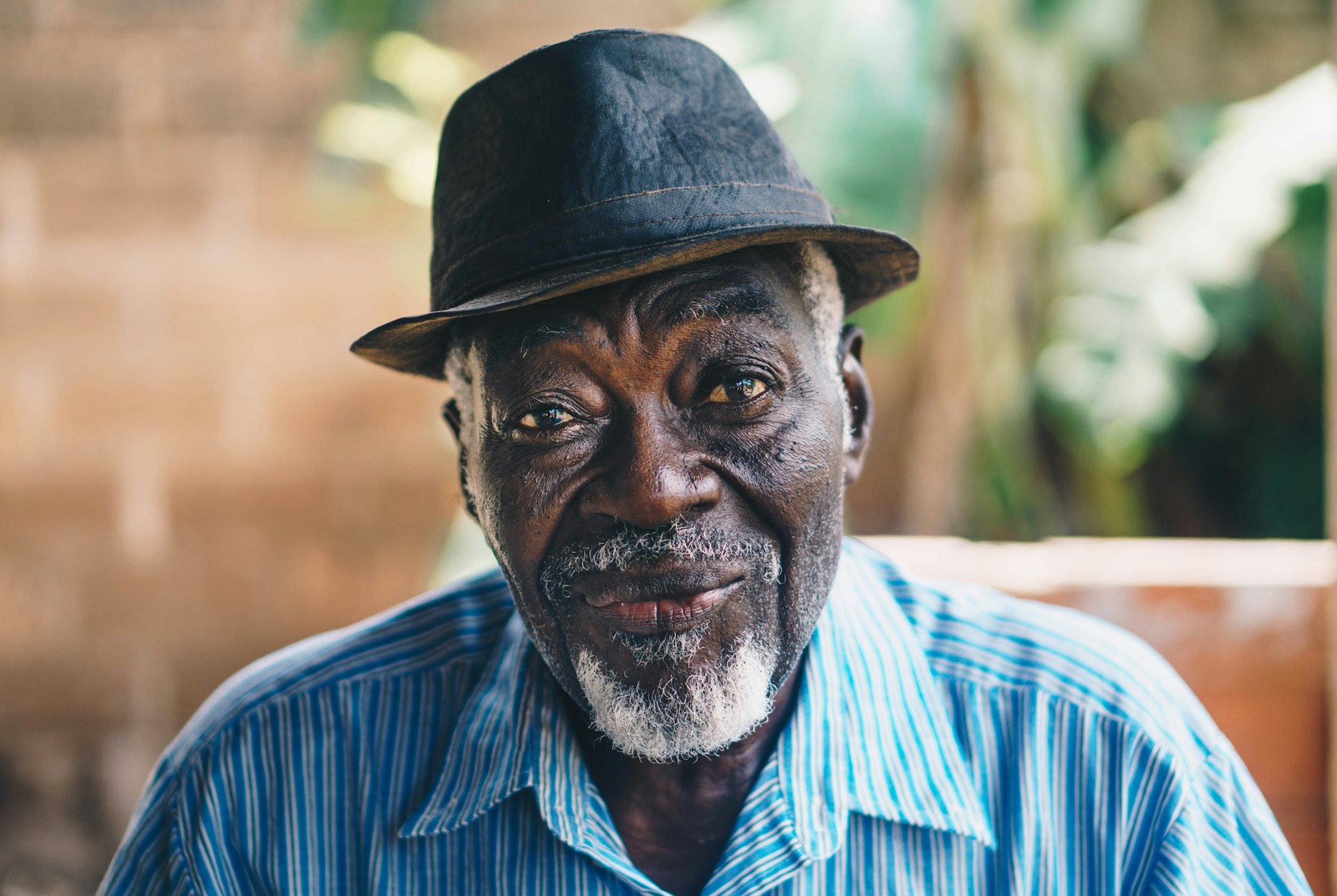 man wearing black hat