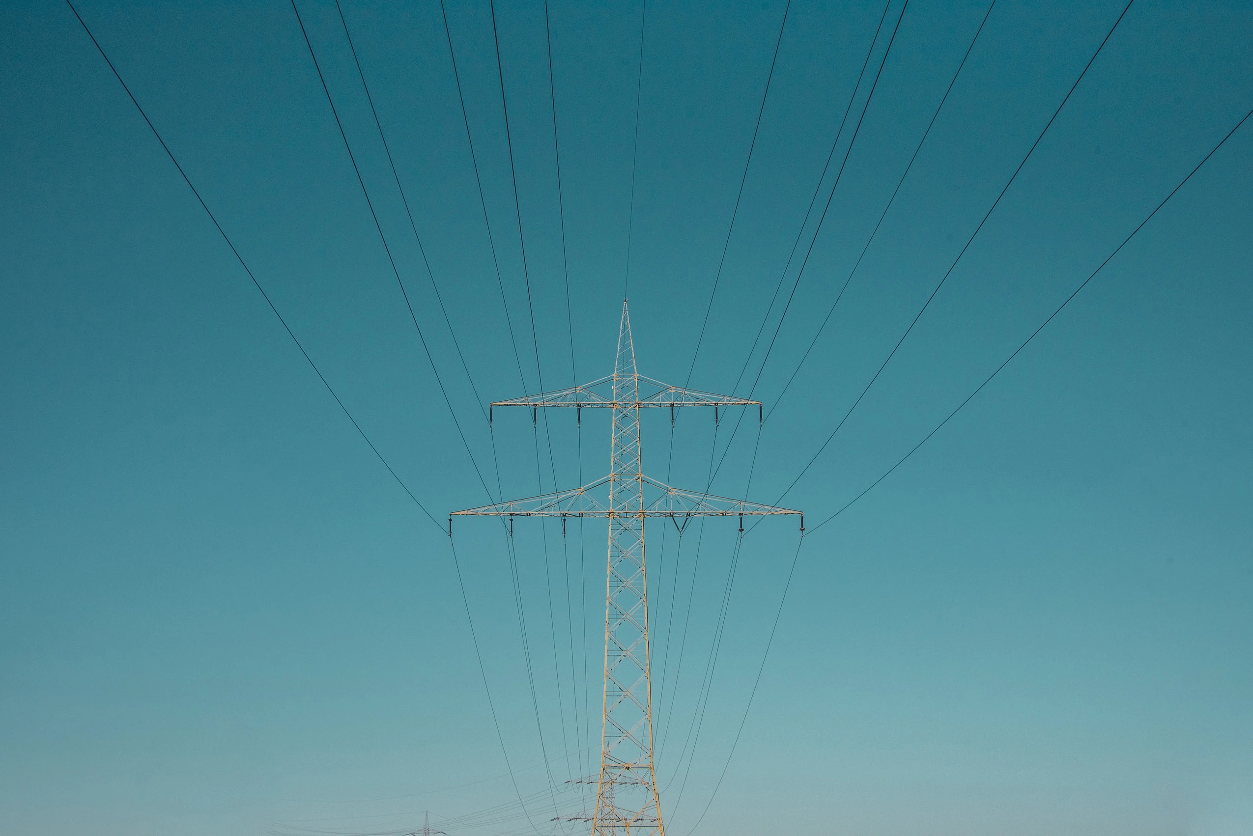 grid power tower on clear sky background