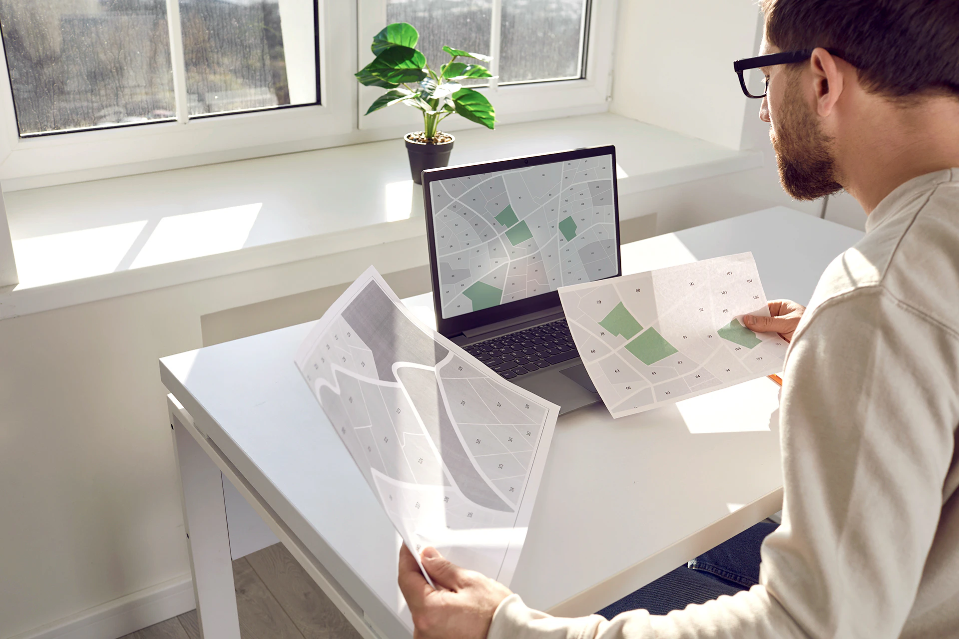 Image of a person working on the tablet with terrain visualisation