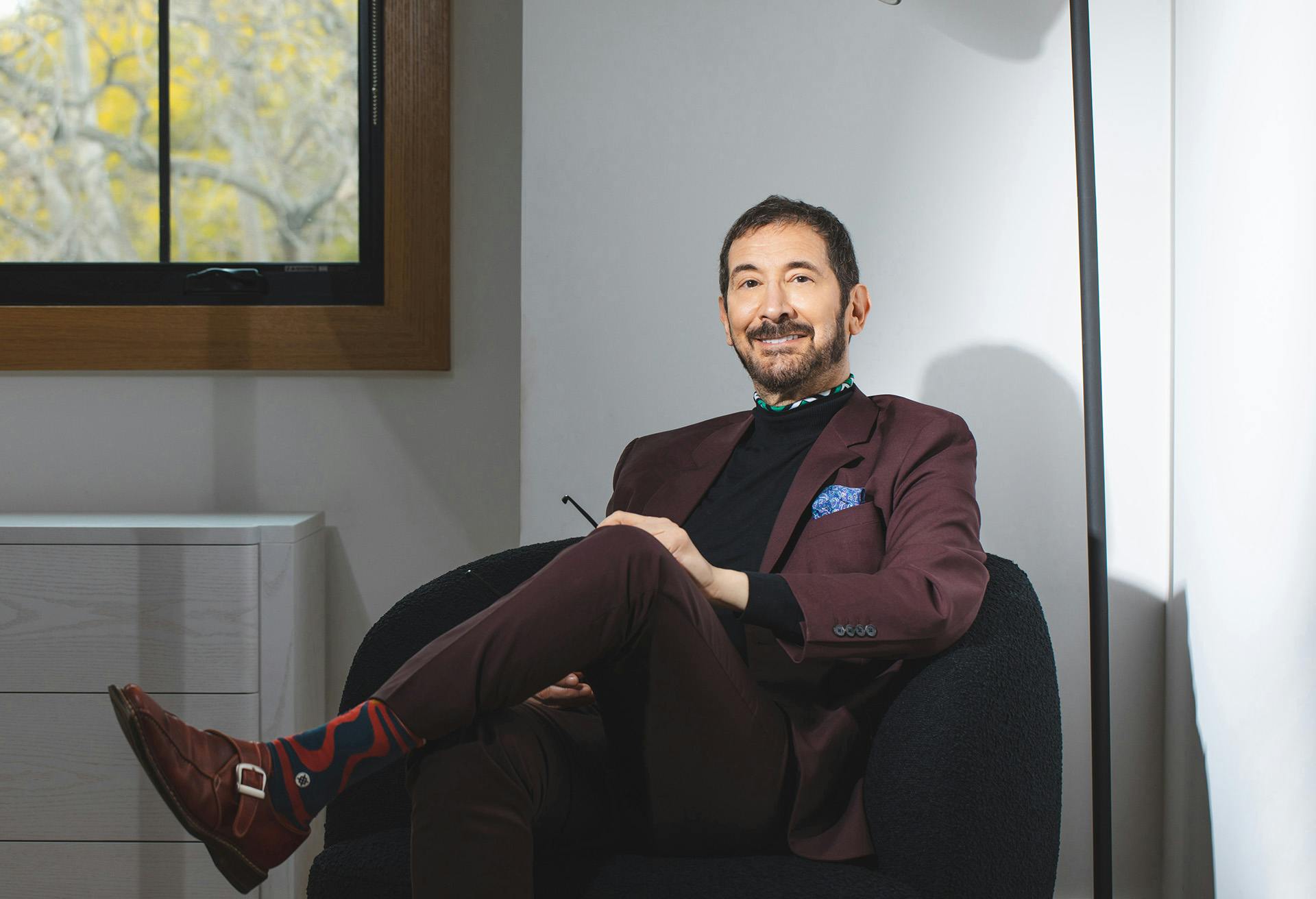 Dr. Sykes sitting in a chair