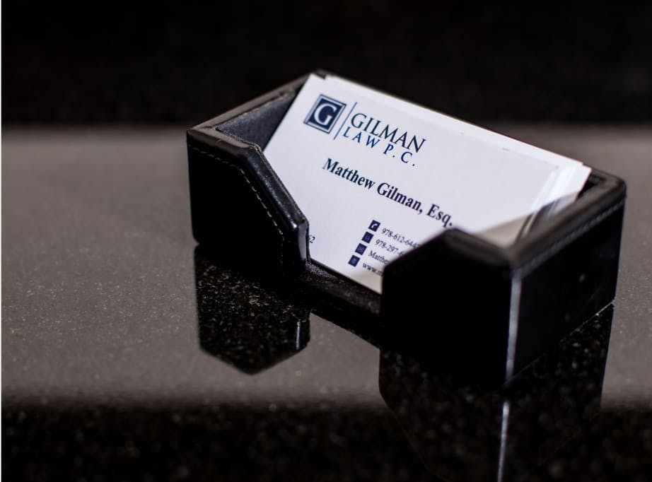 Business card of Gilman Law