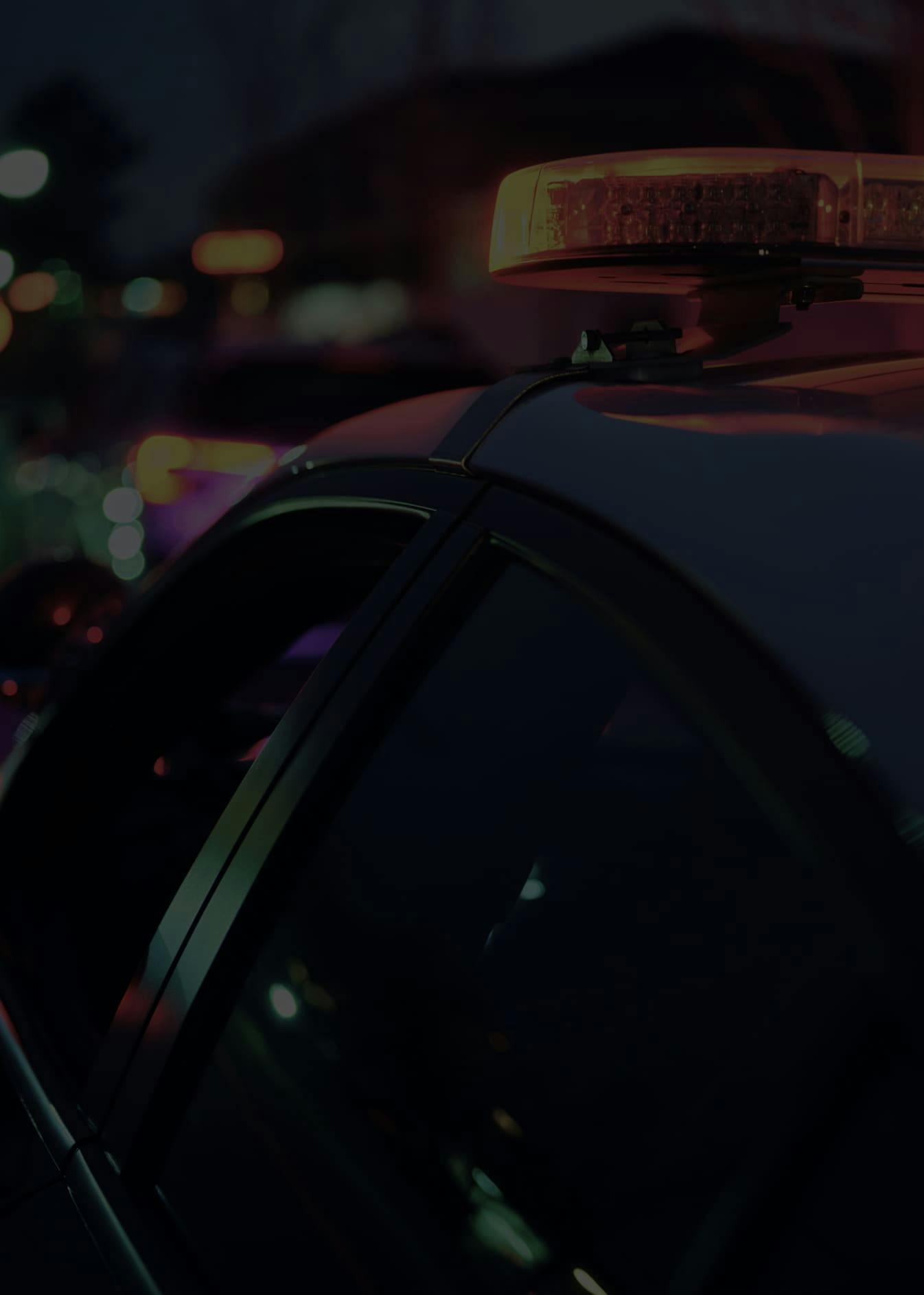 Photo of a police siren at night