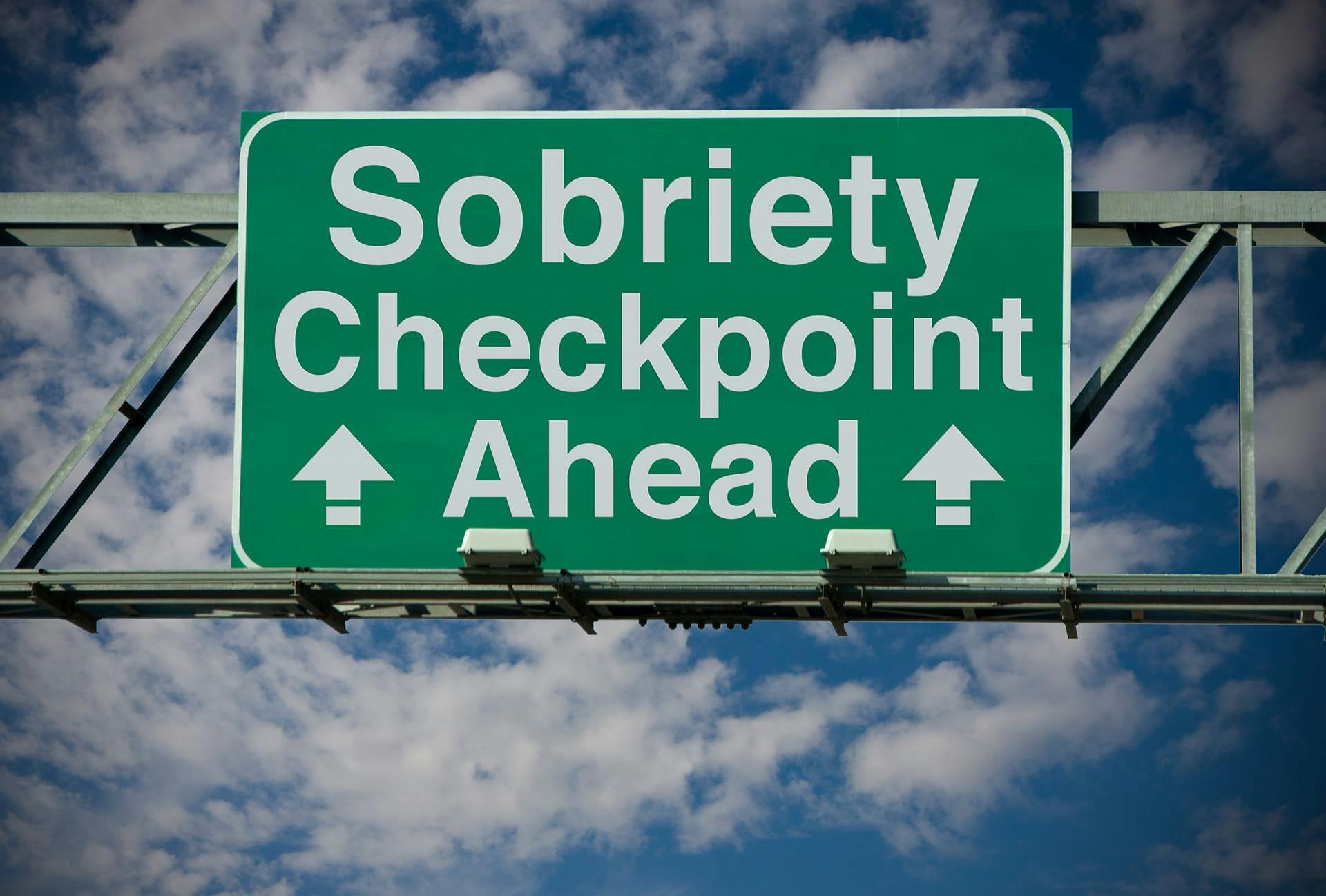 Sobriety checkpoint ahead highway sign