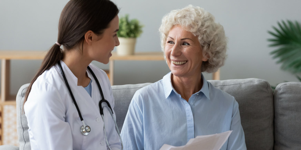 Elderly woman with doctor