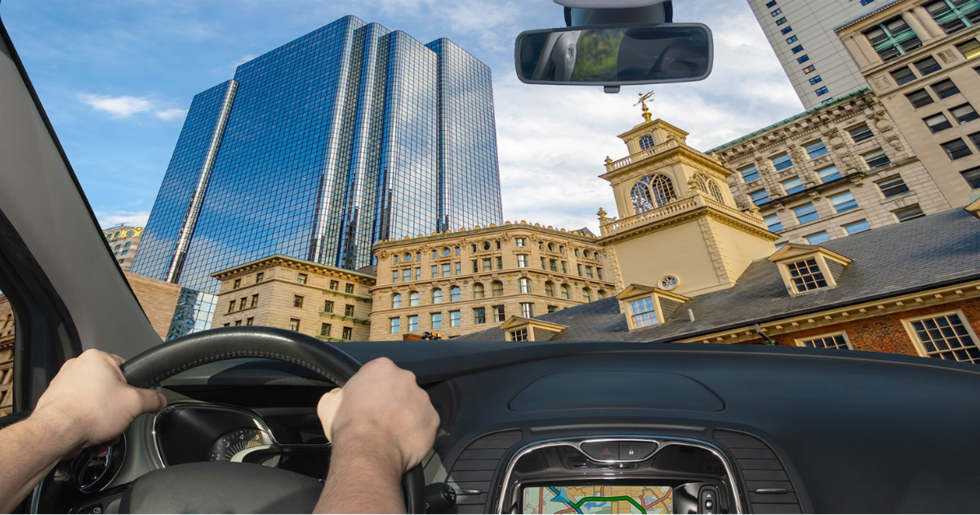 POV of a person driving downtown