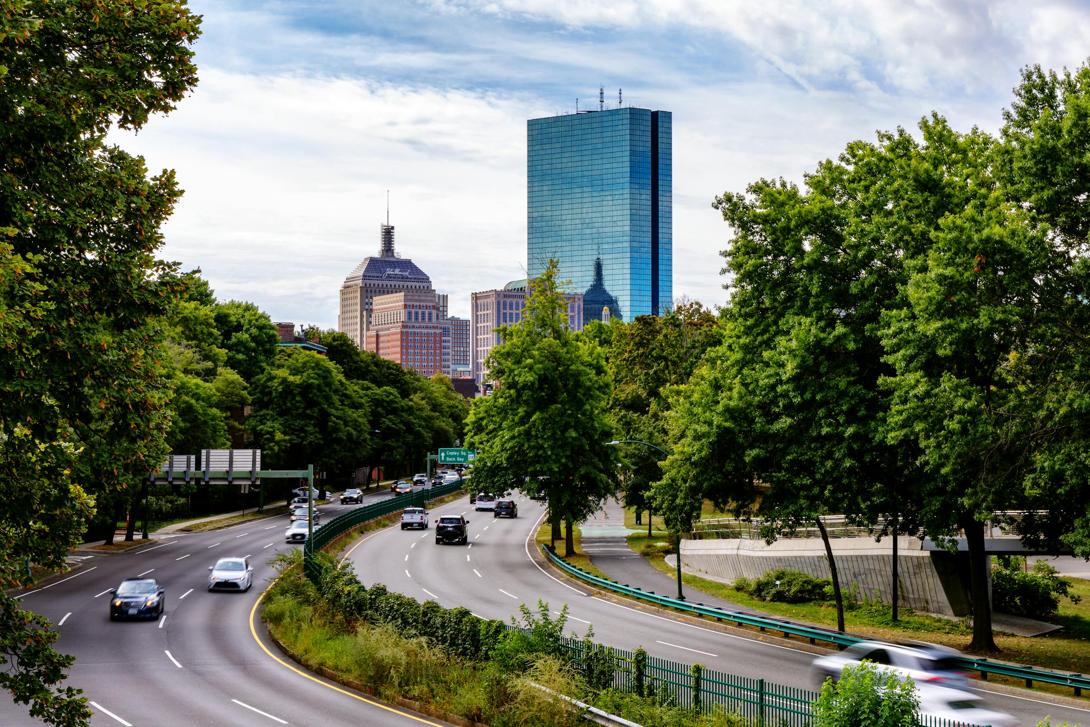 Cars Driving on the road in MA