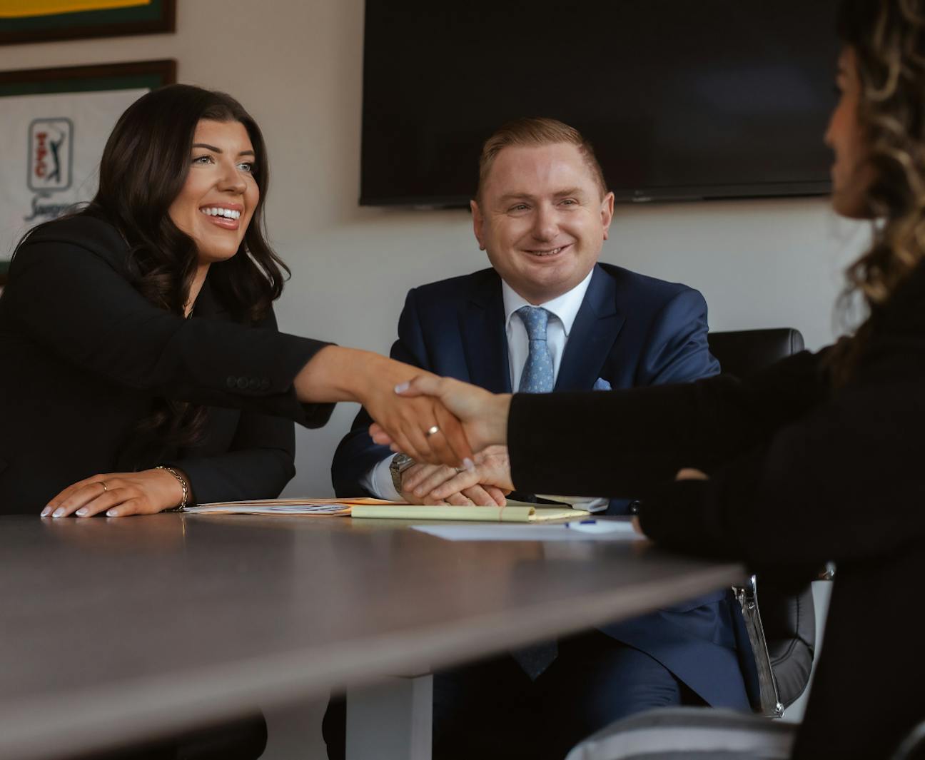 Matthew Gilman shaking someone's hand