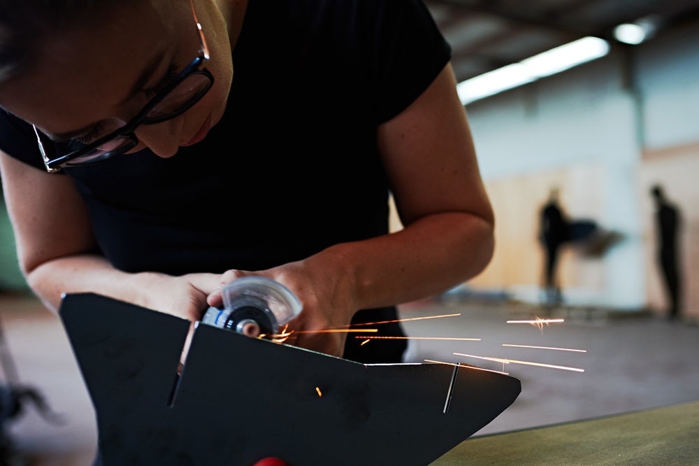 Image for Photo of person grinding metal