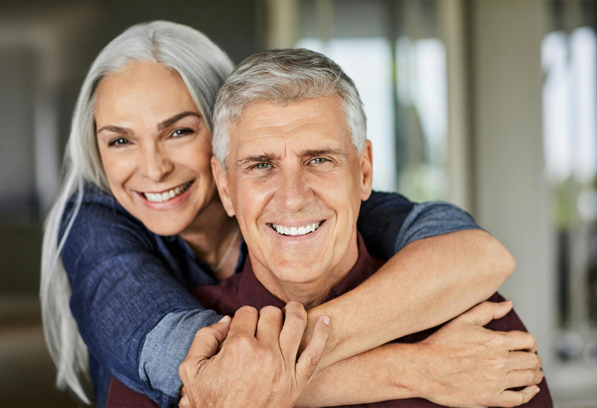 Woman hugging a man