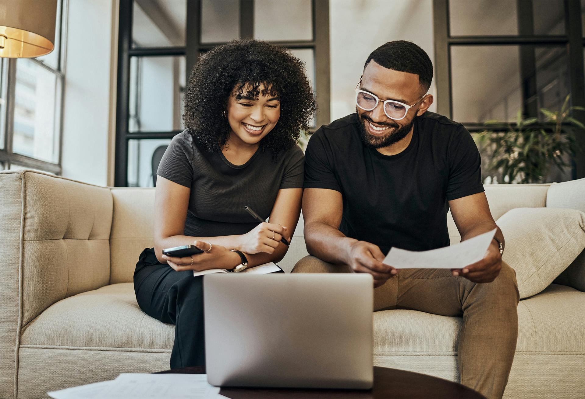 Man and woman on a laptop