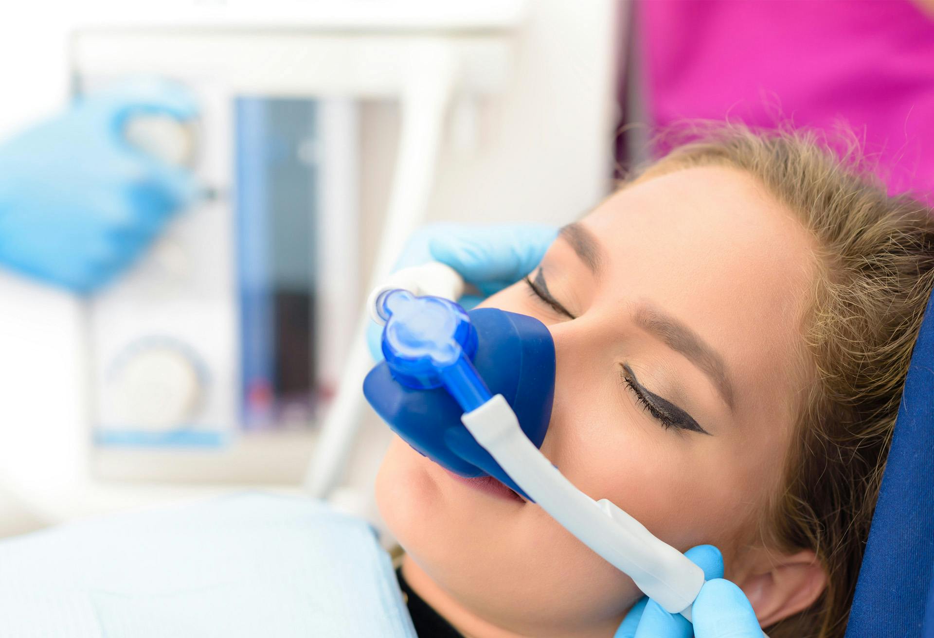A woman getting sedated