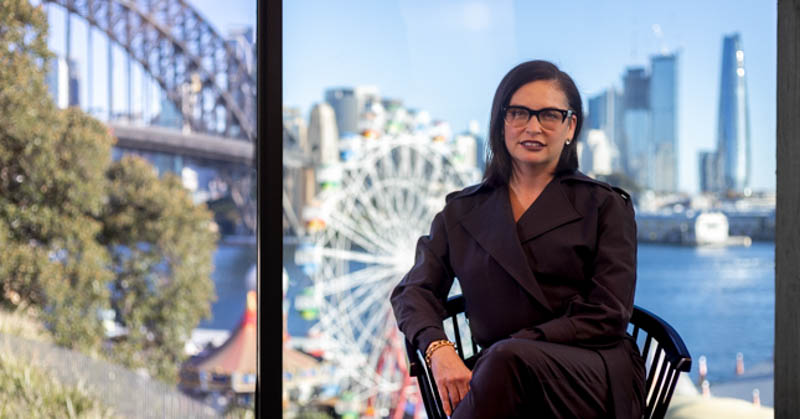 interior designer lorena gaxiola reclines in harbourside sydney office