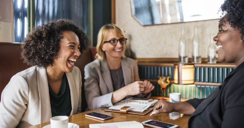 happy female hr managers meet with joyful female candidate