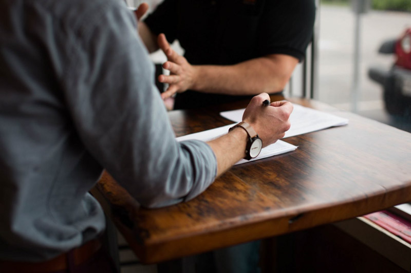 tense conversation between employee and manager