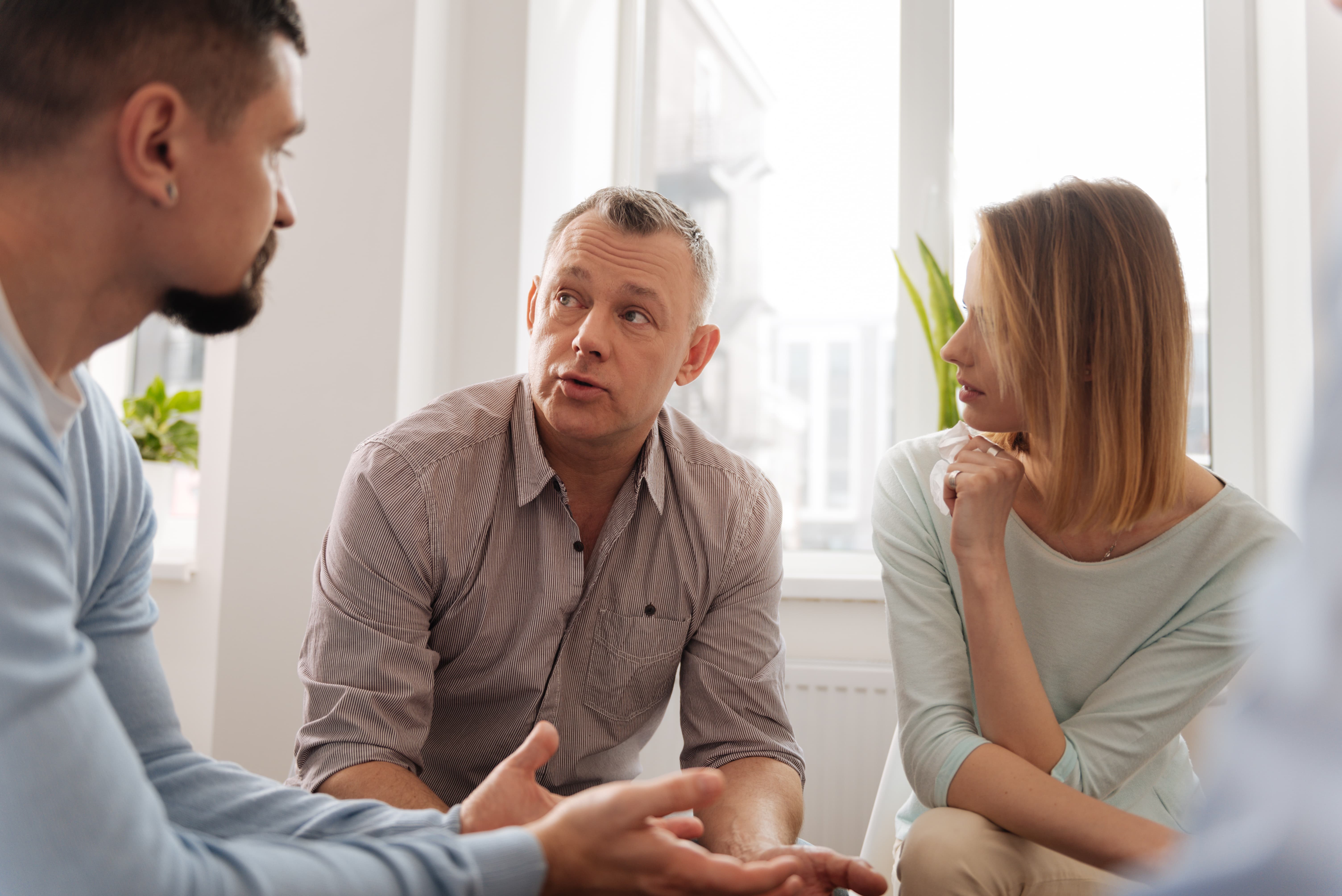 Group of colleagues sitting together having a discussion
