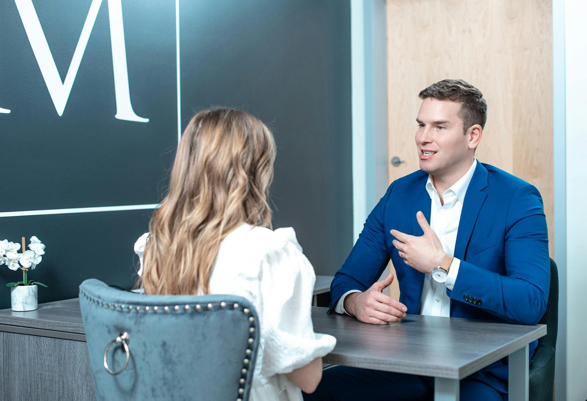 Dr. Gardenier speaking with a female patient