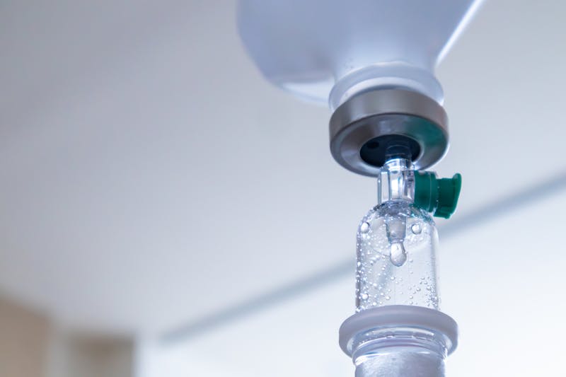 Close-up of an IV hydration drip.