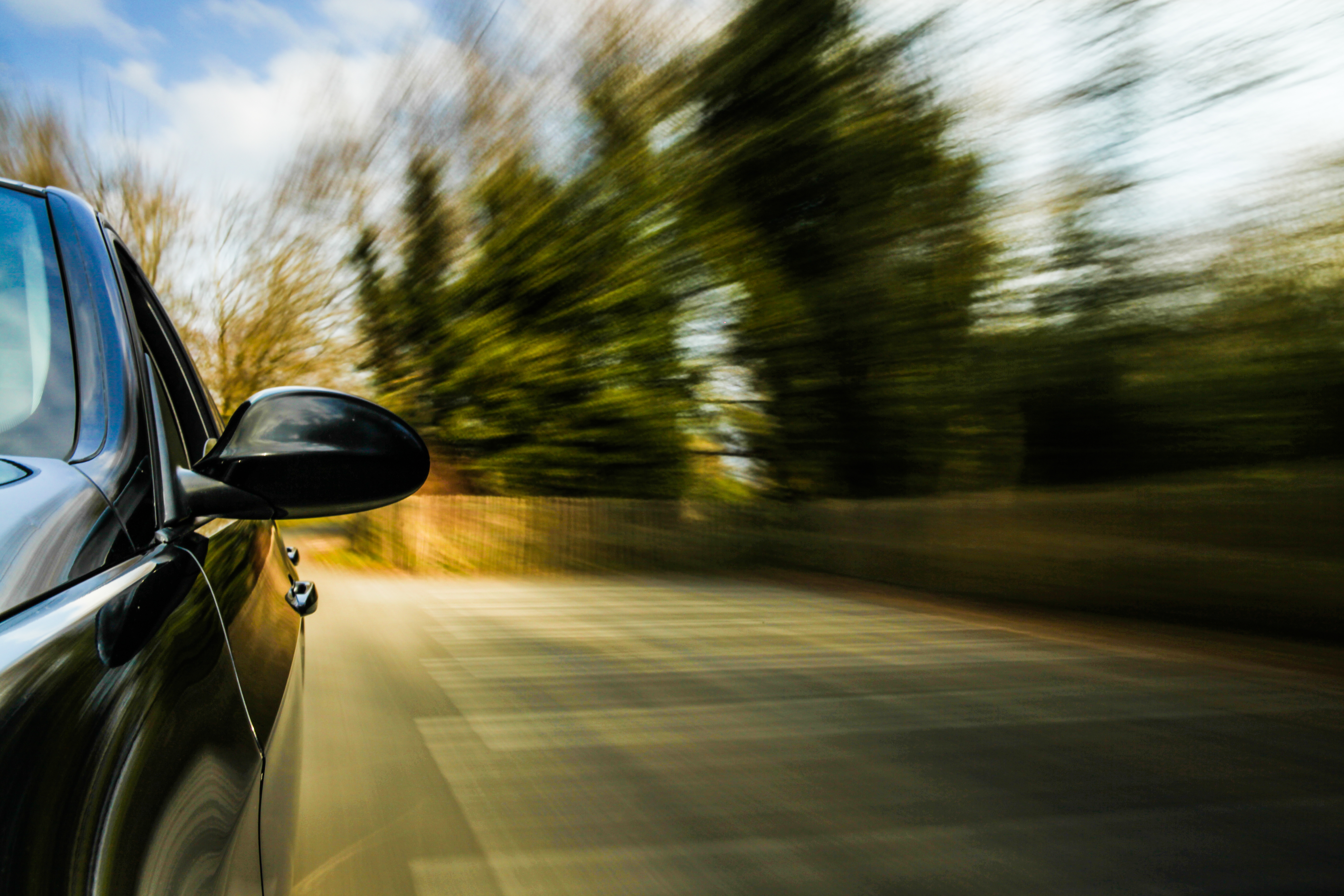 Car on road with blurred background