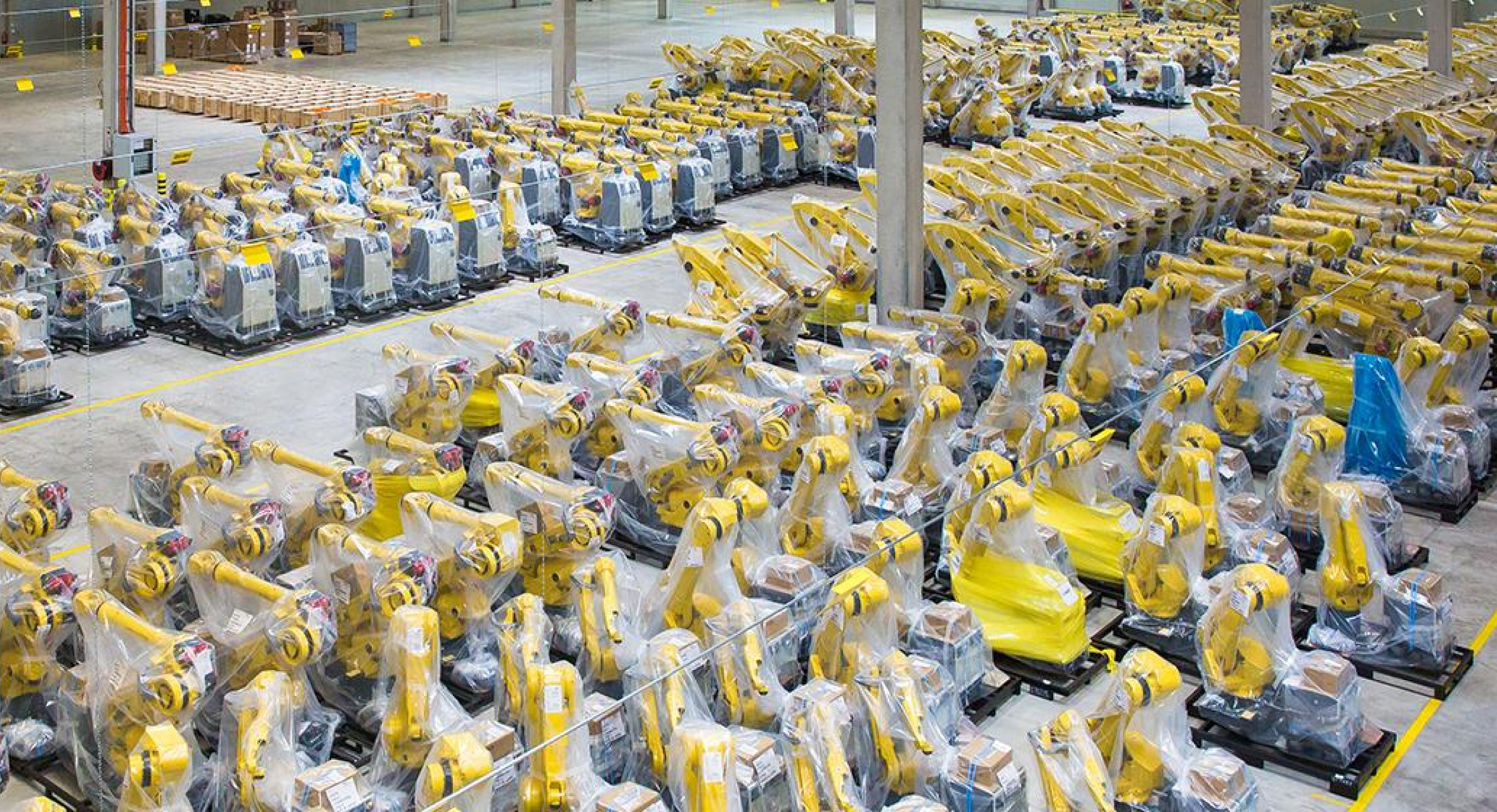 FANUC Ltd warehouse with multiple rows of yellow machinery