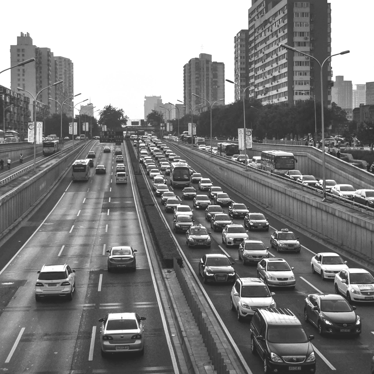 Busy road in the city in black and white