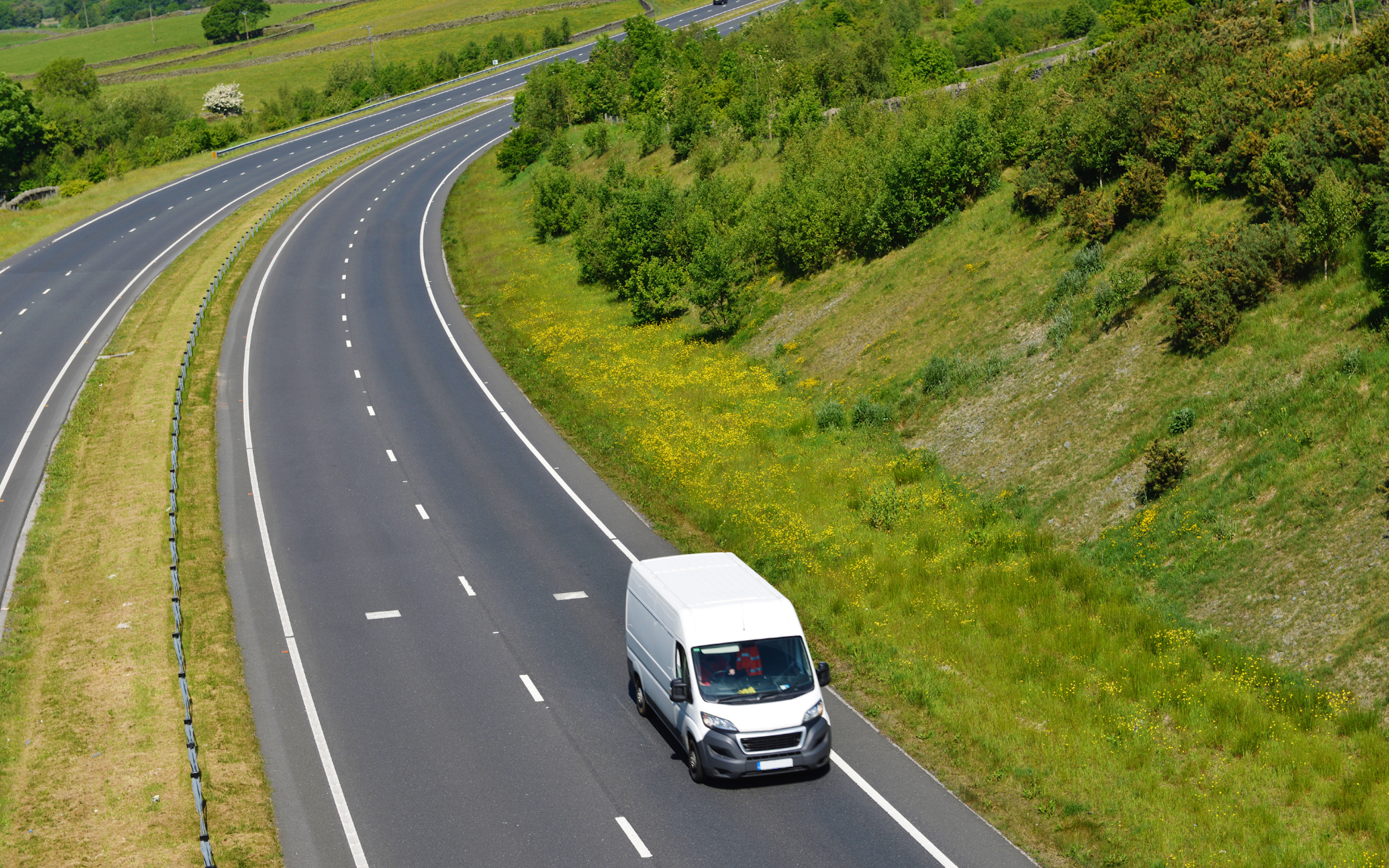 Van on road in country