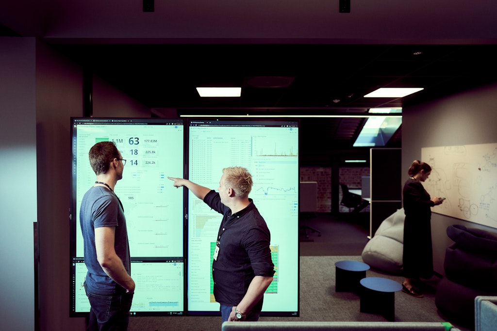 ABAX colleagues analysing data