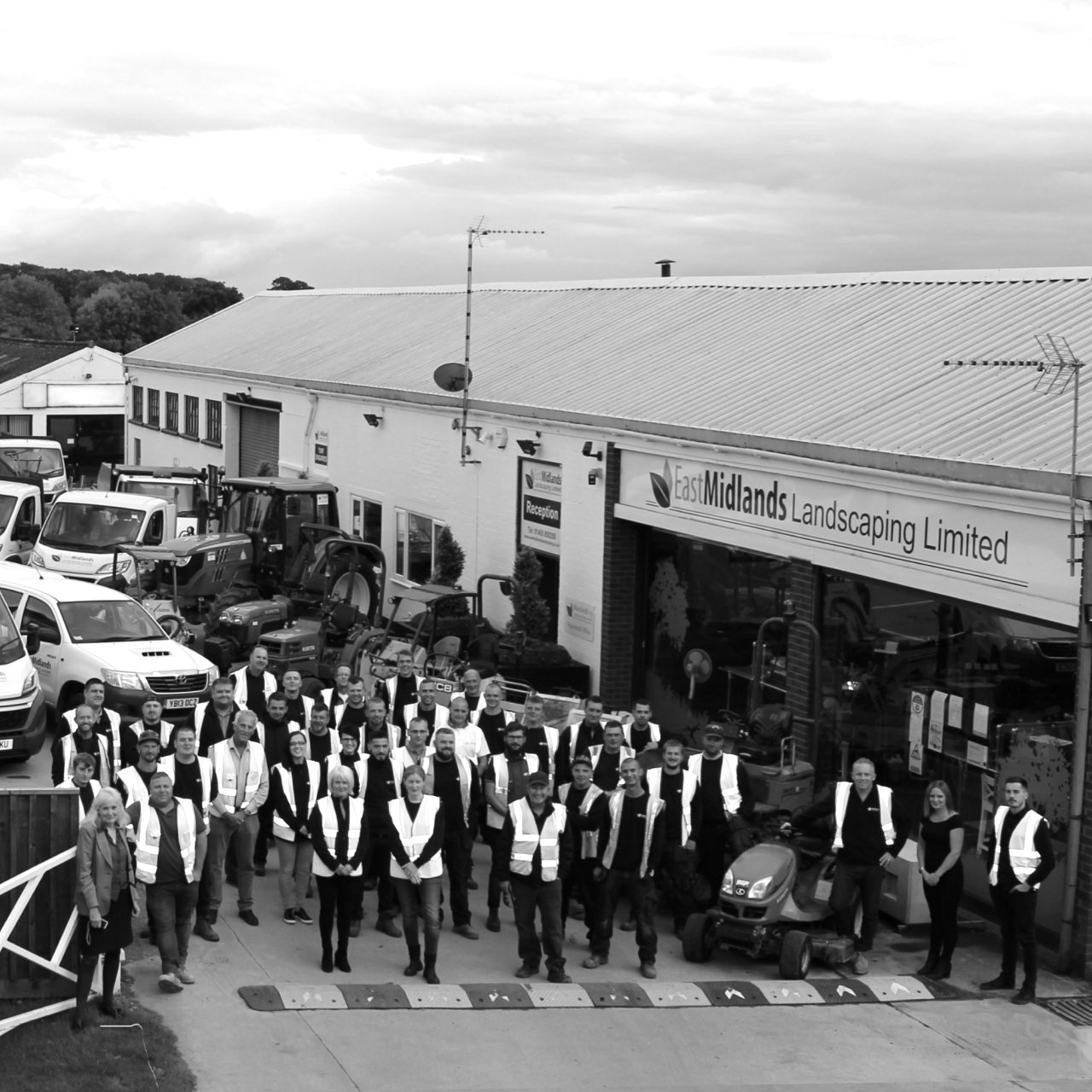 East Midlands Contracting company picture in black nd white with all staff and vehicles