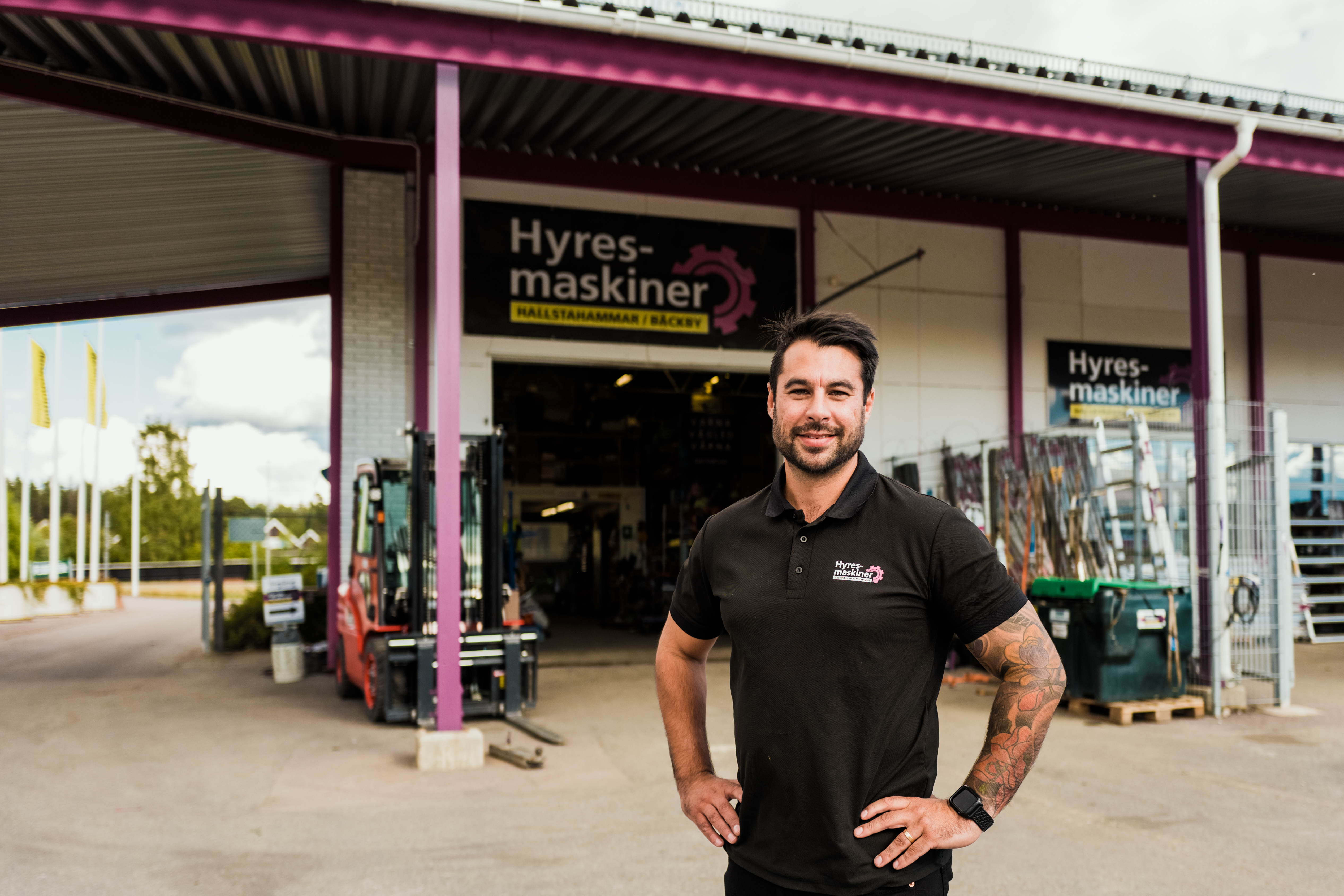 Man in front of swedish equipment hire shop