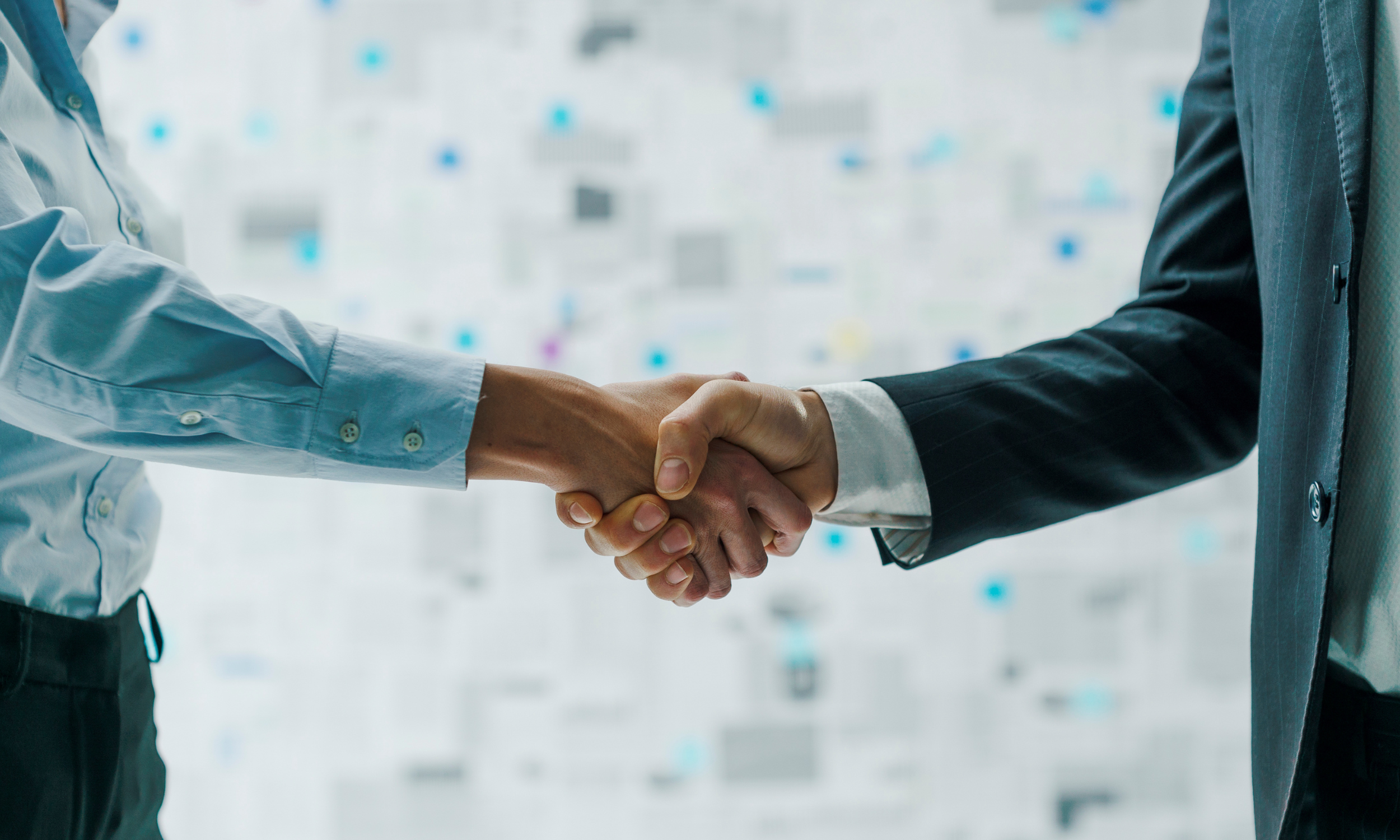two people shaking hands