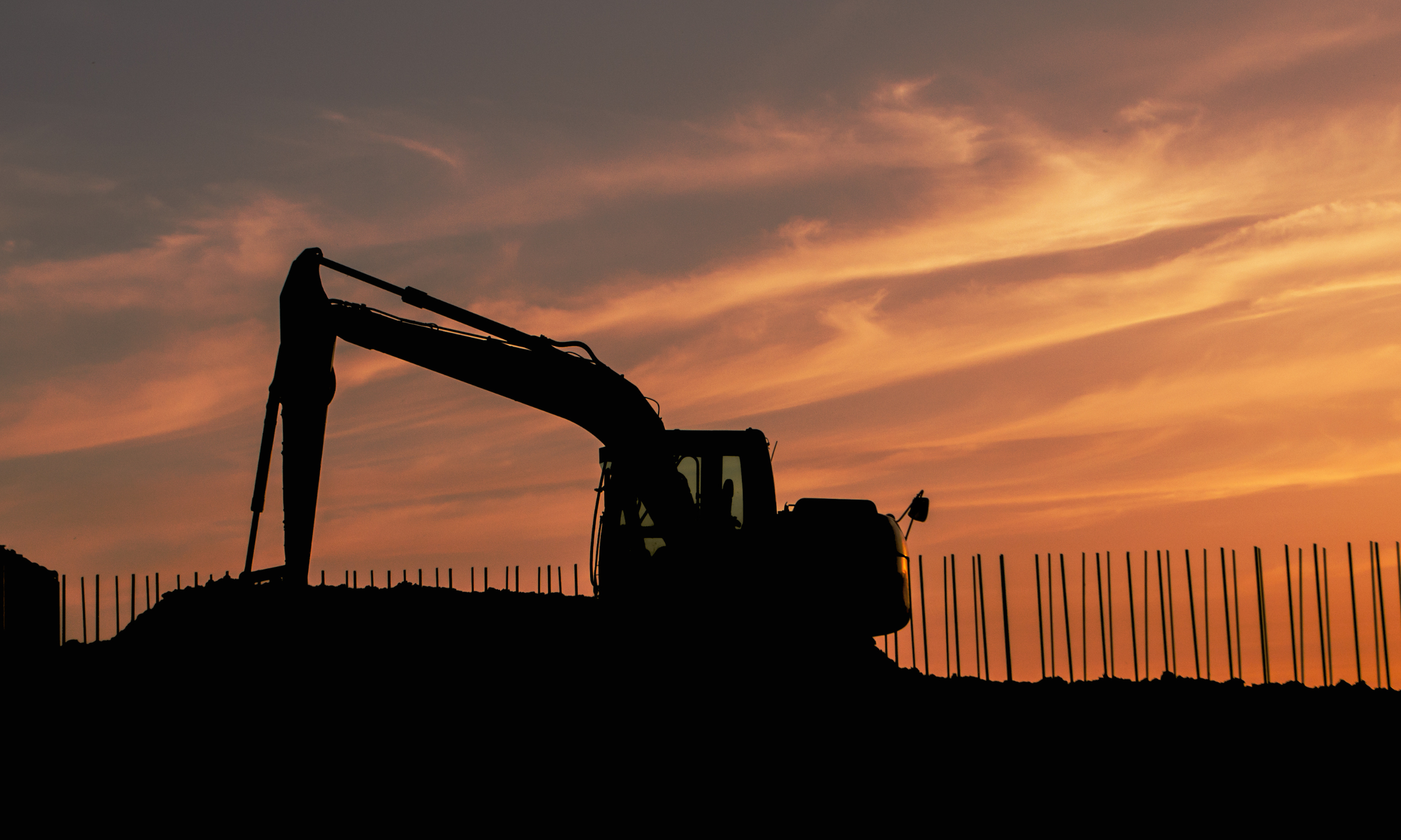 digger in sunset