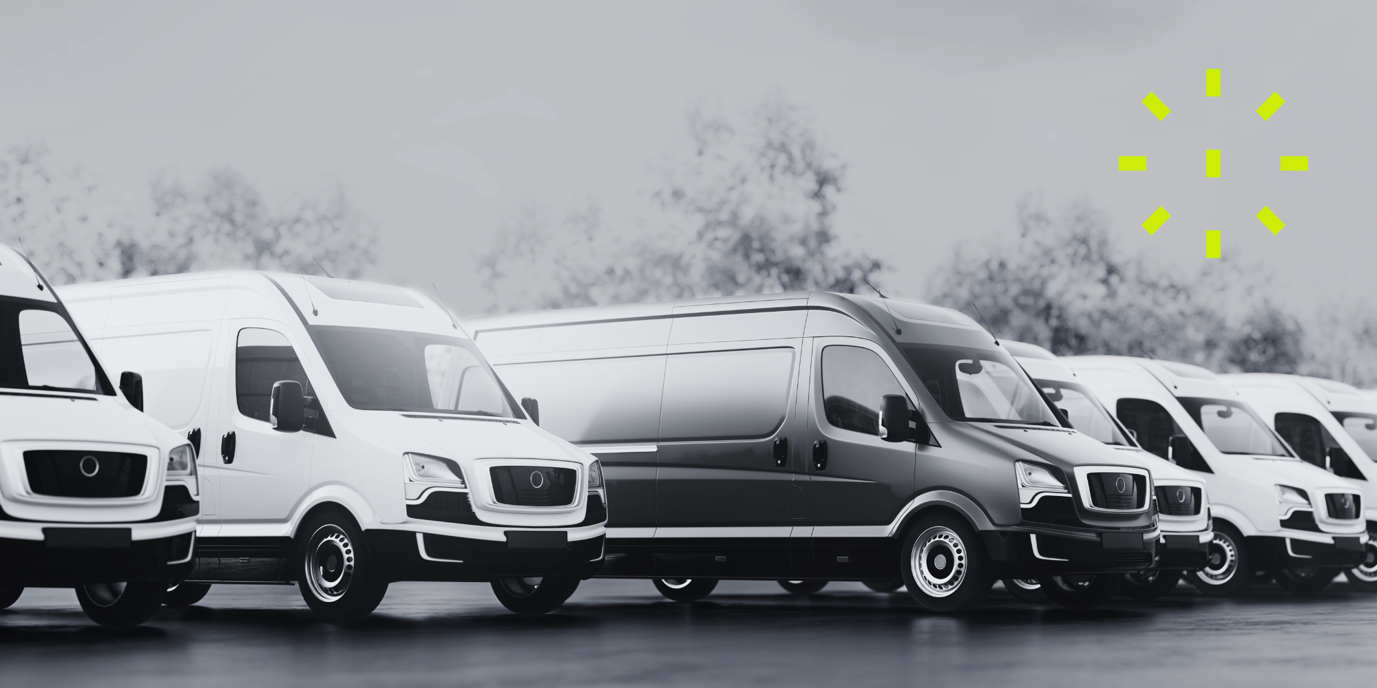 Black and white image of vans in a row with ABAX green graphic in top right corner