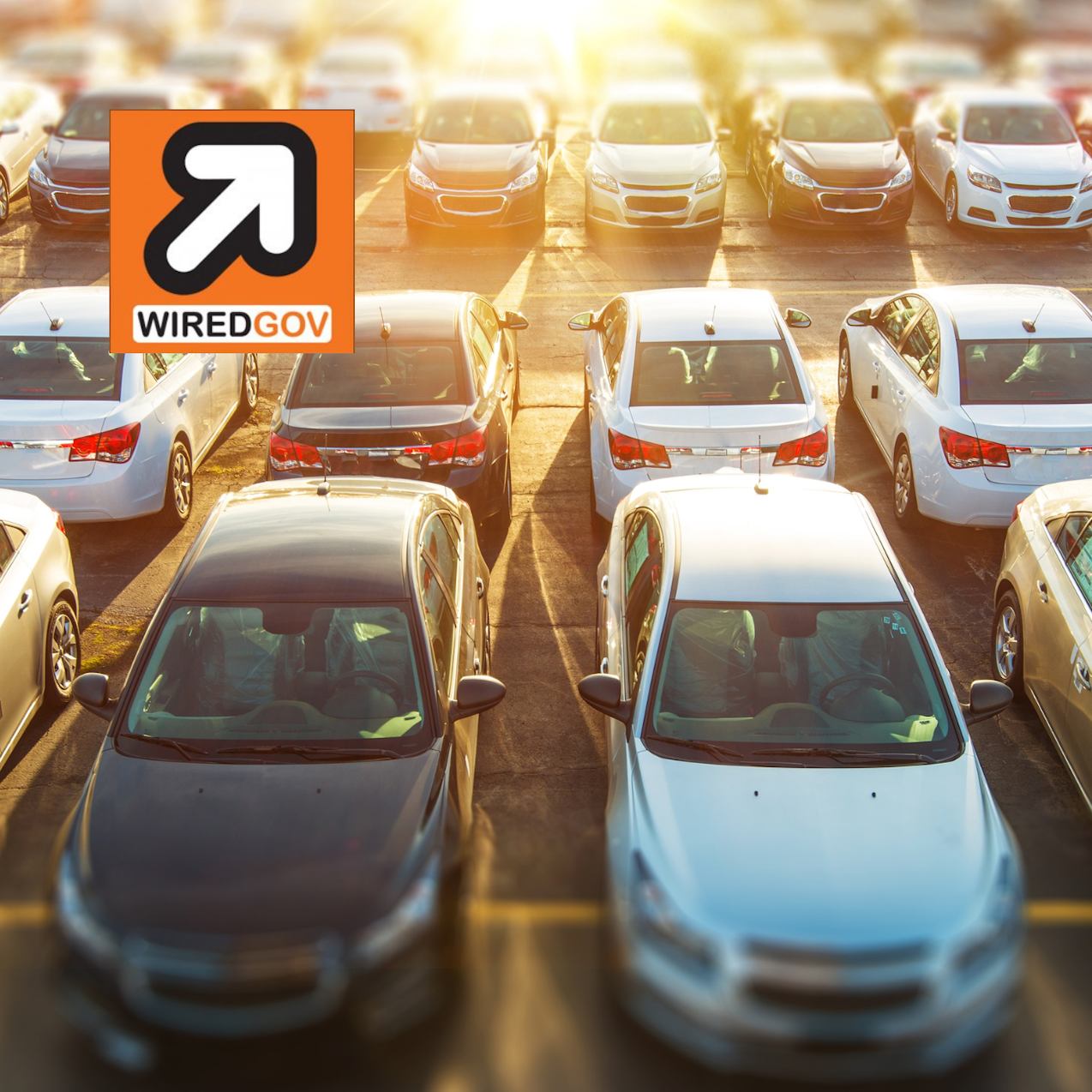 White arrow with orange background from WiredGov.net logo