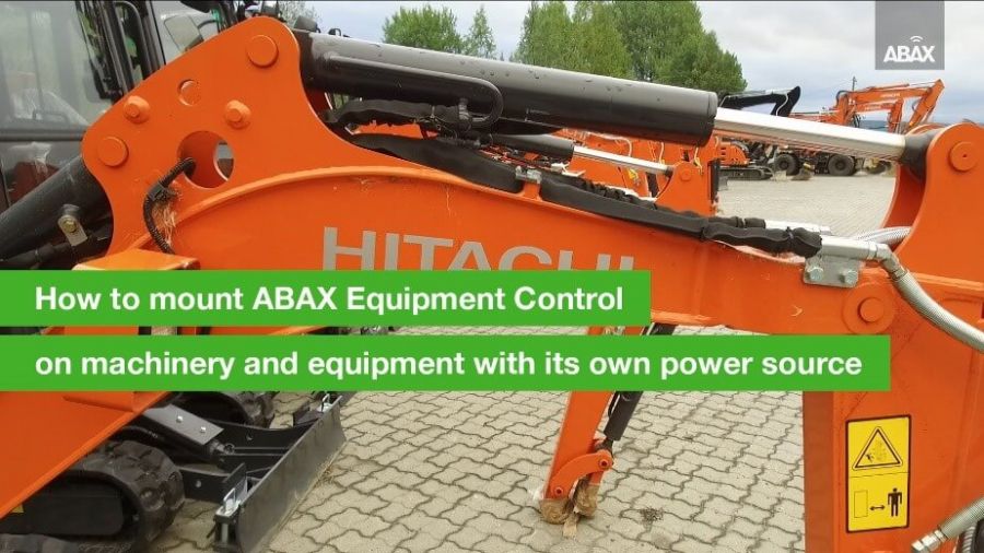 An orange hitachi excavator arm