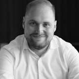Erik Rehn smiling at camera