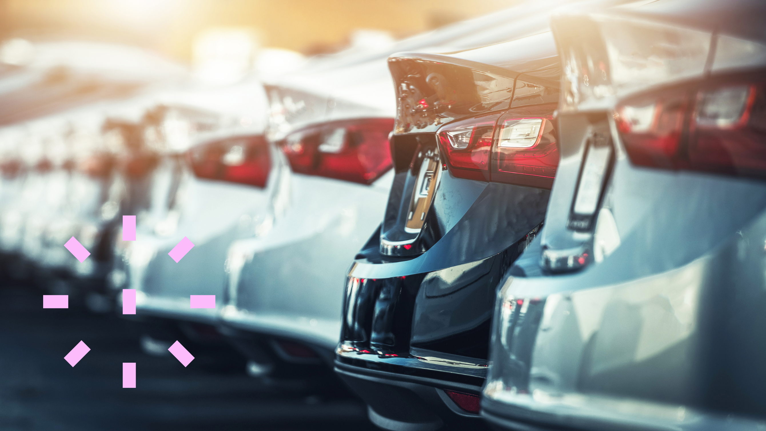 Cars lined up in car park