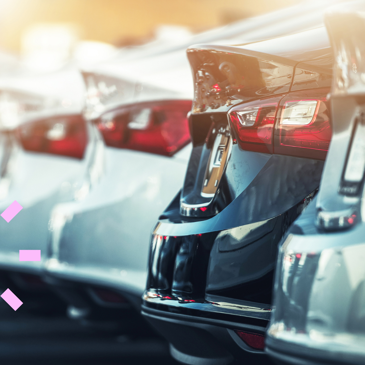 Cars lined up in car park
