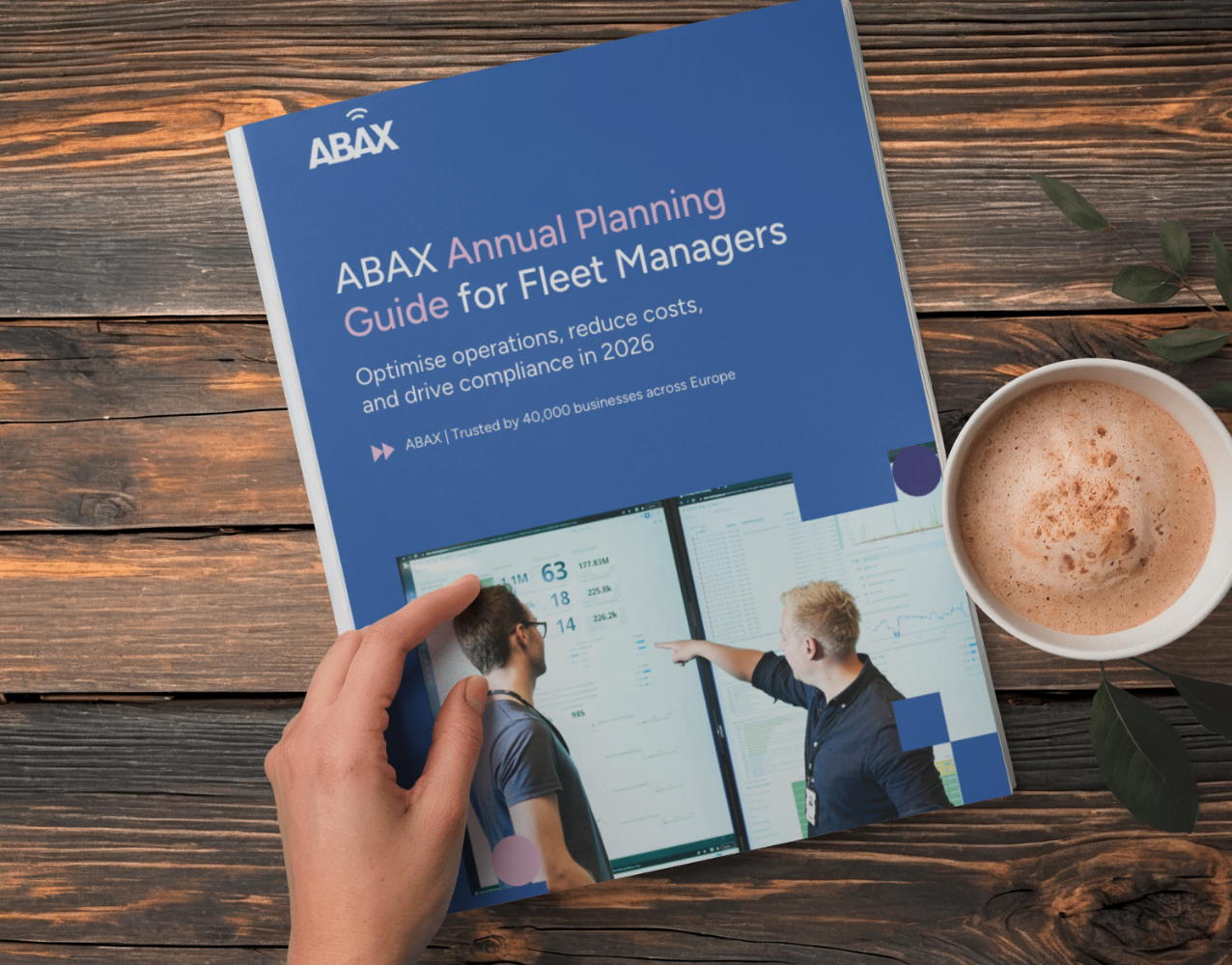 Fleet guide on a wooden table with someone's coffee sat next to it