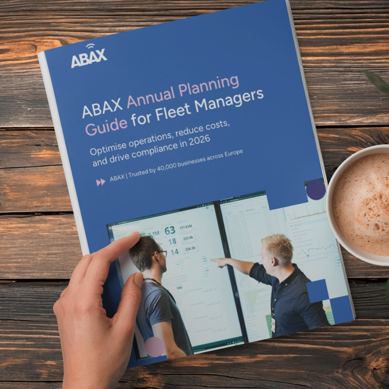 Fleet guide on a wooden table with someone's coffee sat next to it