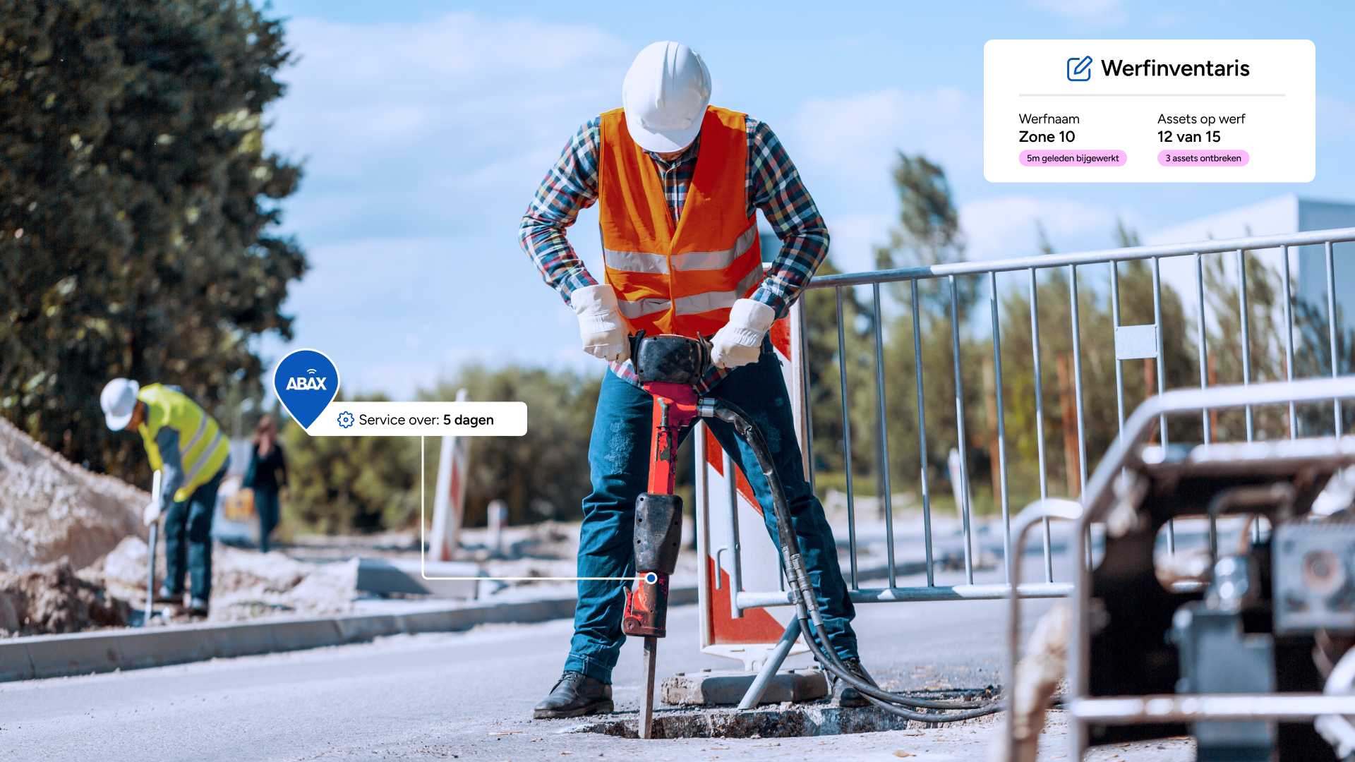 man met gereedschap in wegenbouw