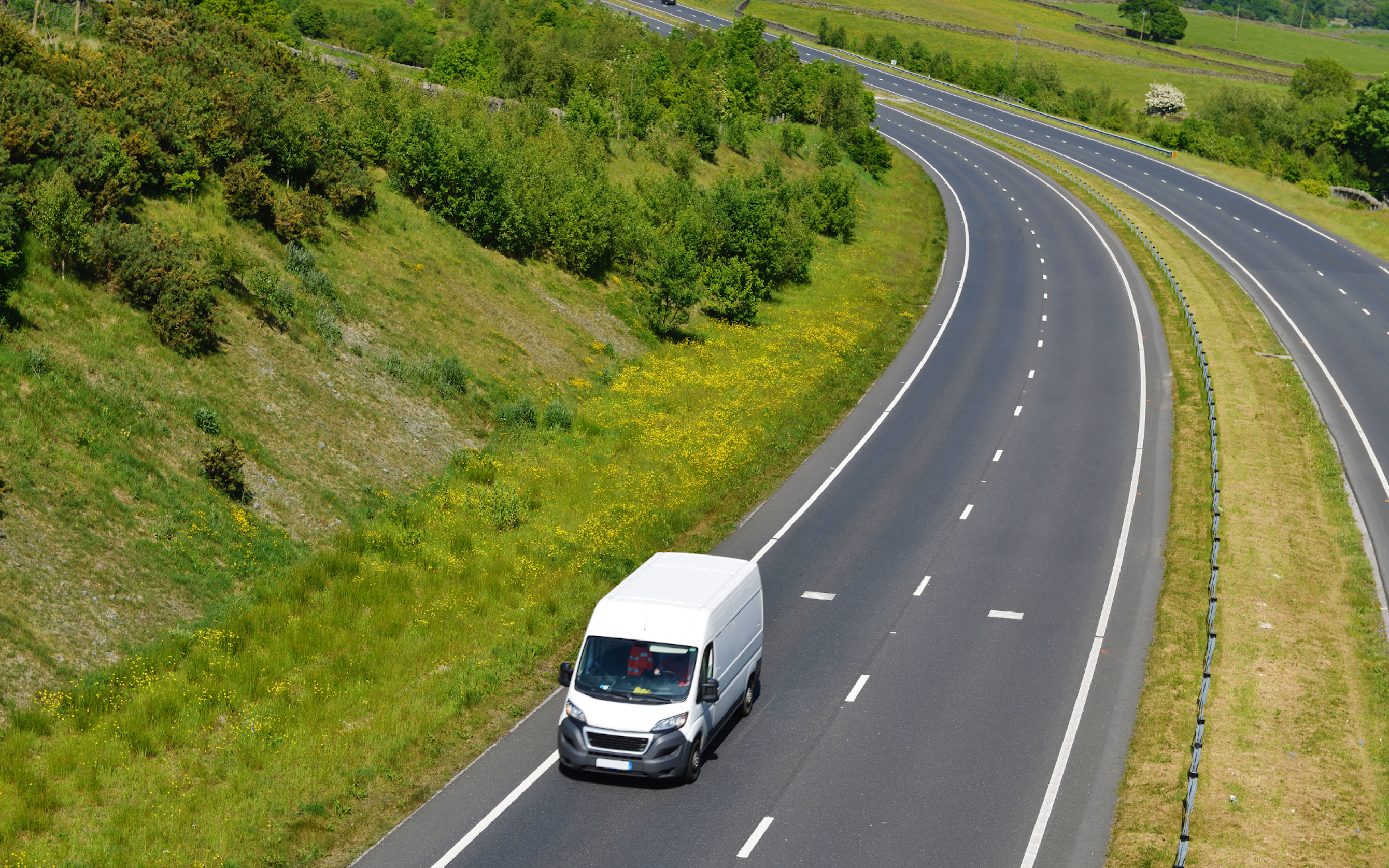 Van on road in country
