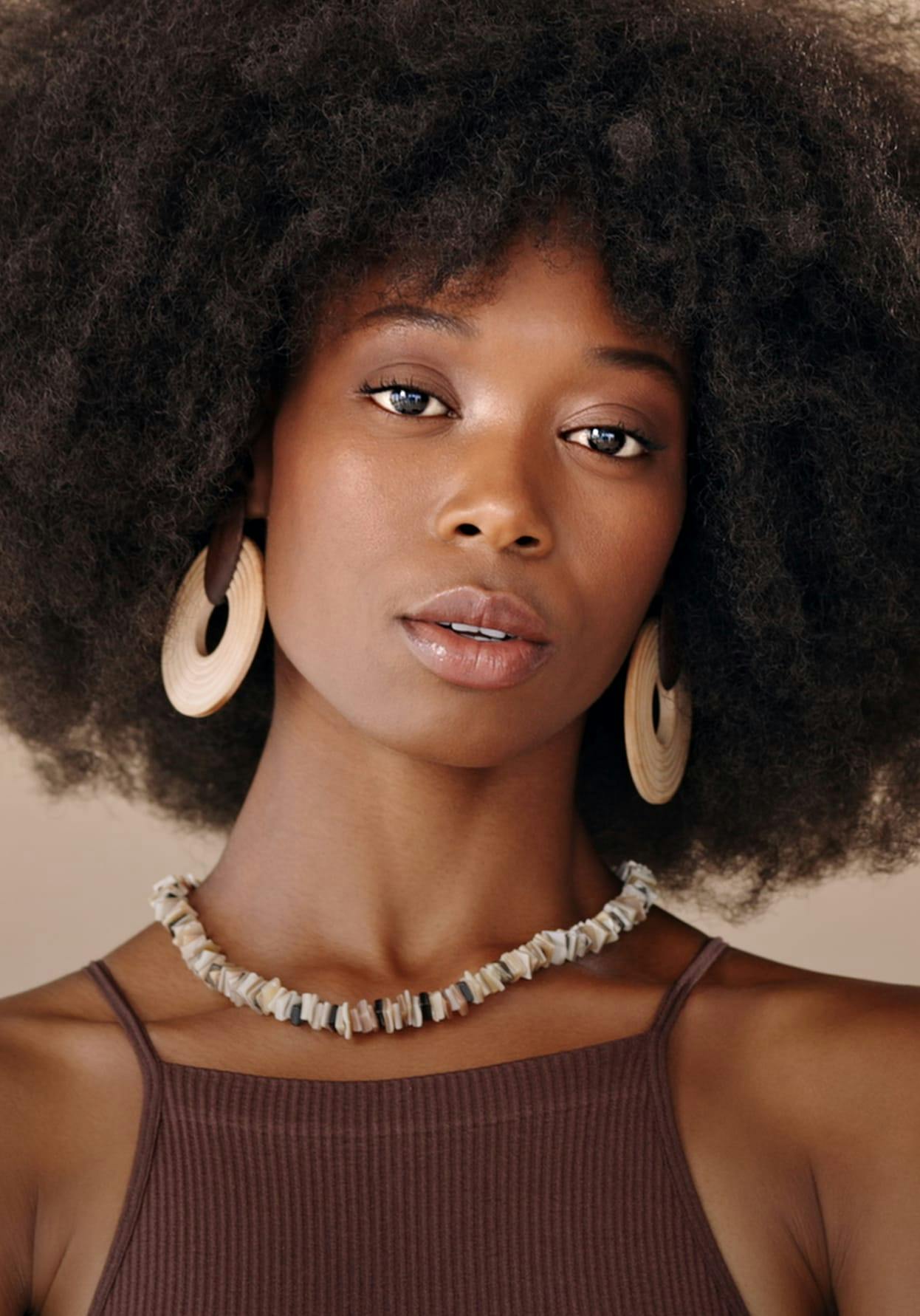 Beautiful woman with big curly hair