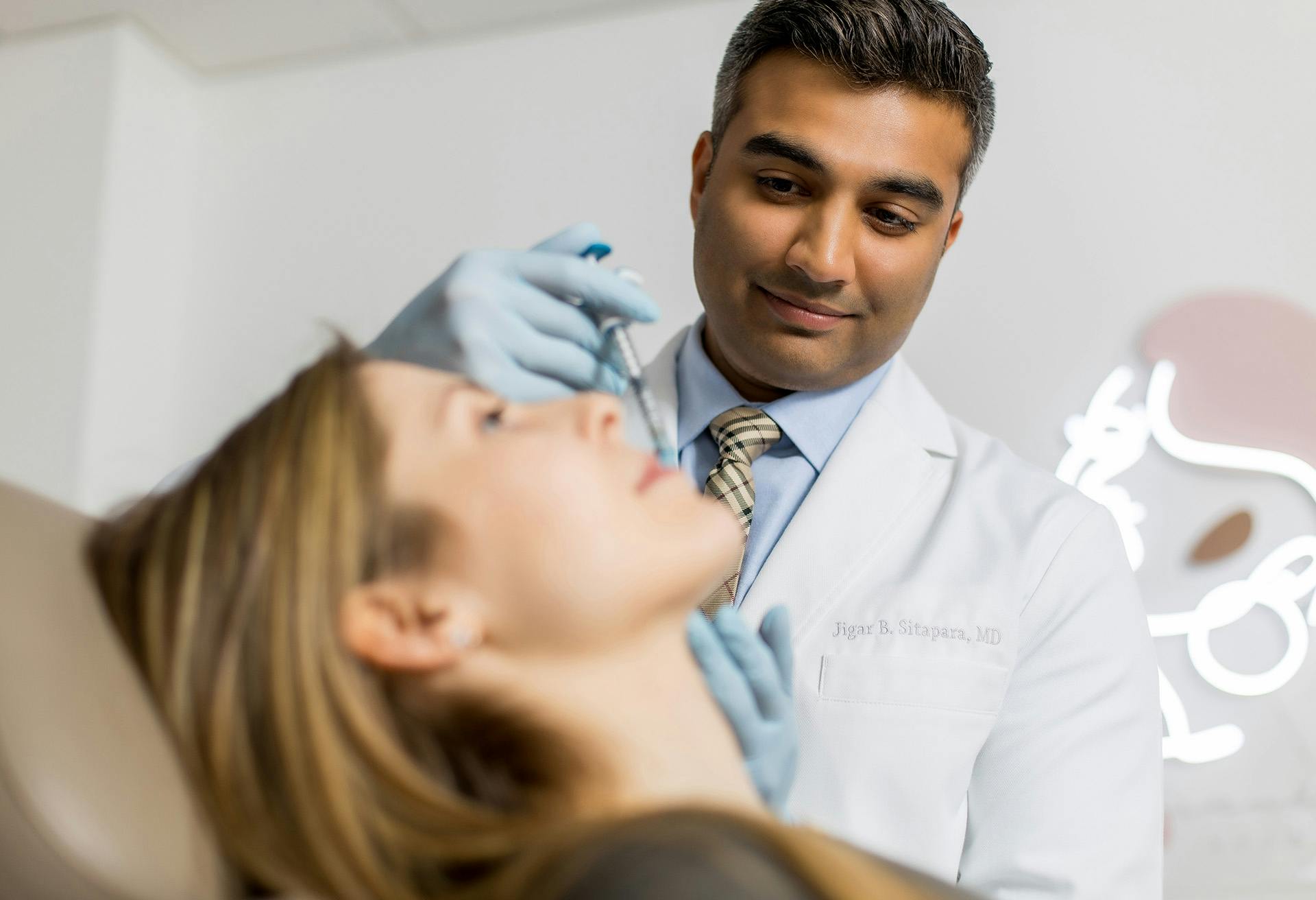 Dr. Sitapara Administering an Injection