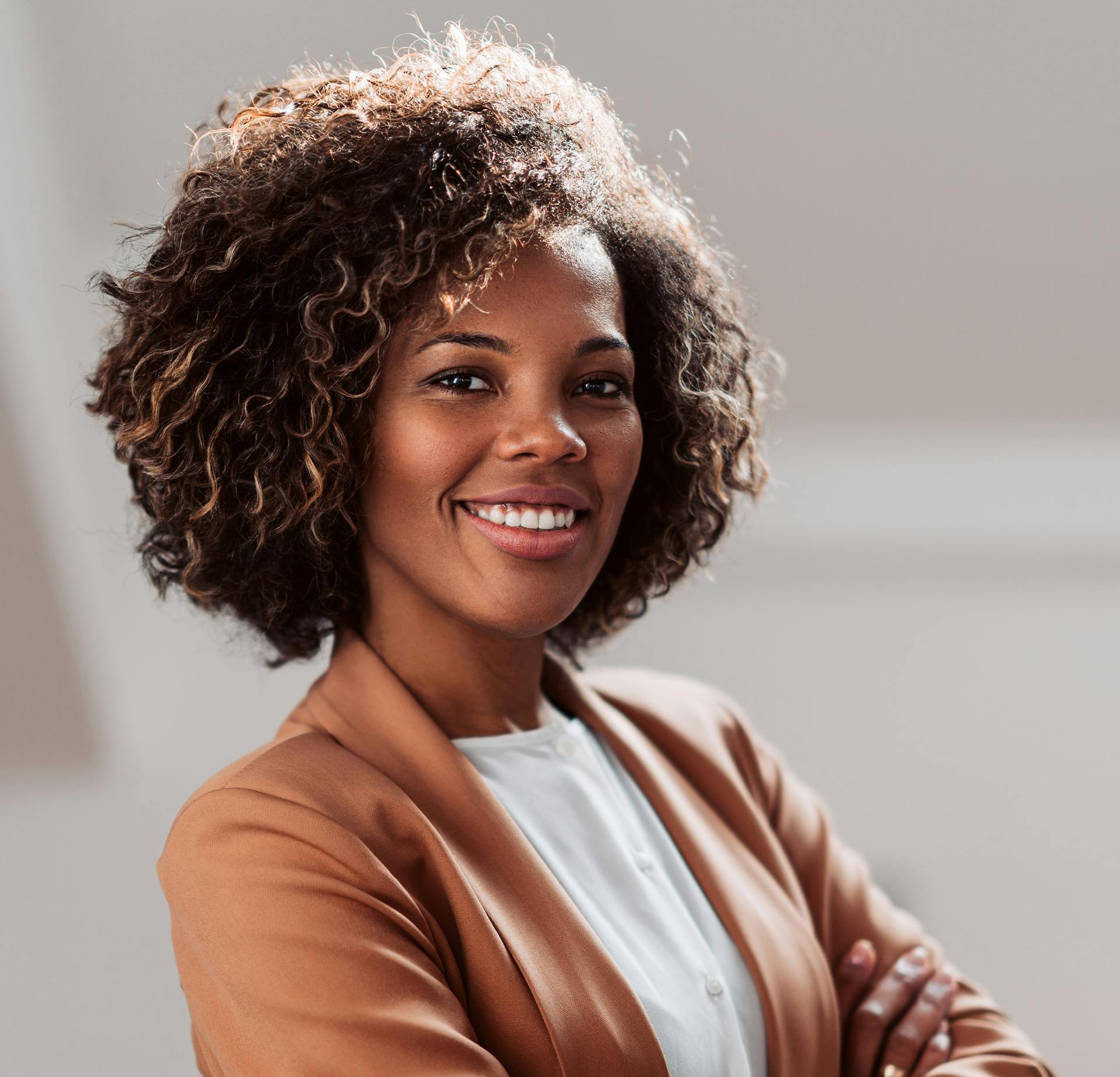 Woman Posing with Her Arms Crossed