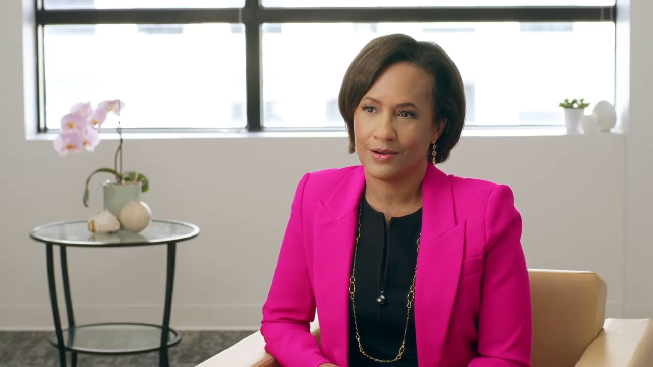 Dr. Porter Wearing a Pink Blazer