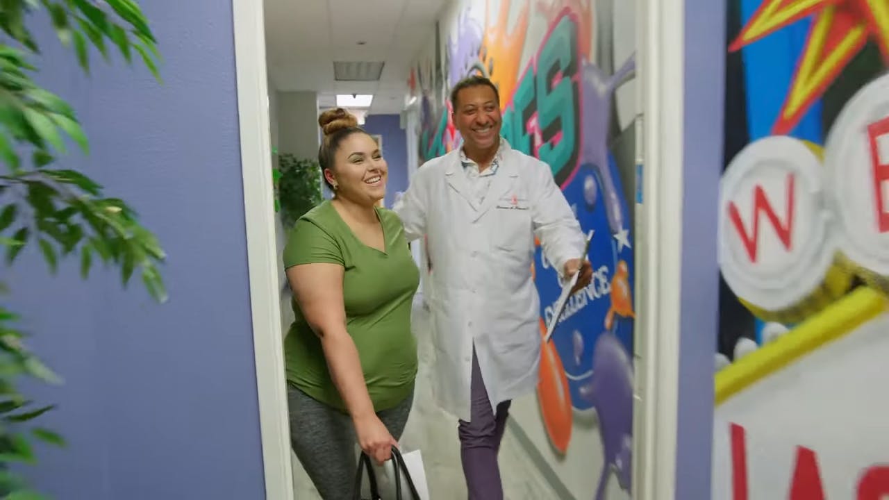 Man and woman in hallway