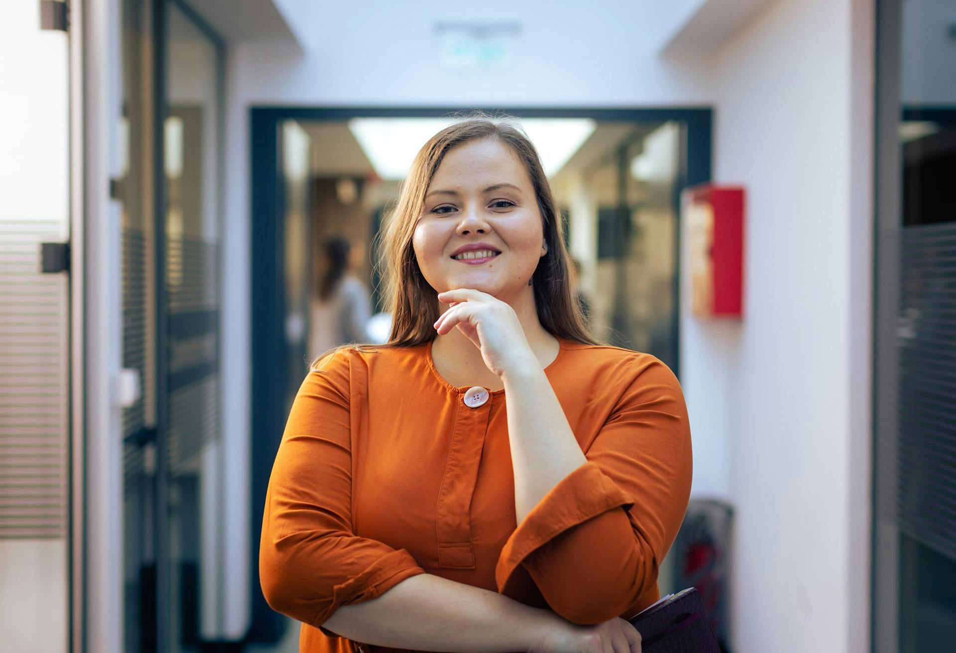 Woman in an orange shirt