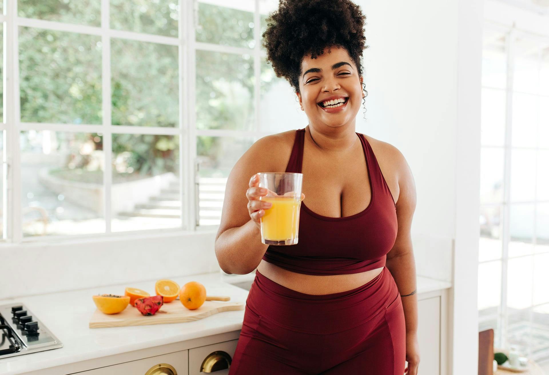 Woman drinking orange juice